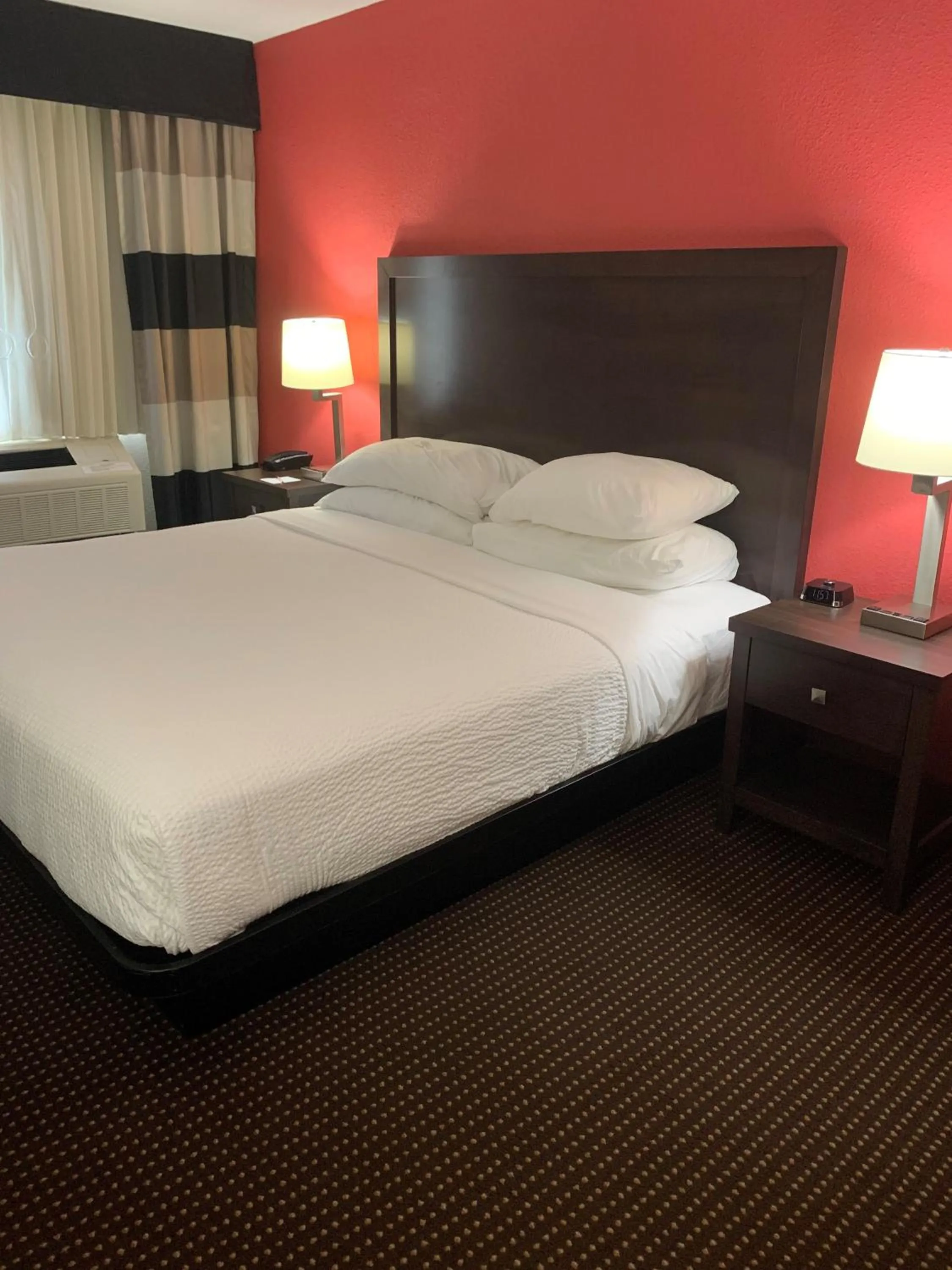 Bedroom, Bed in Ramada by Wyndham Hancock Waterfront