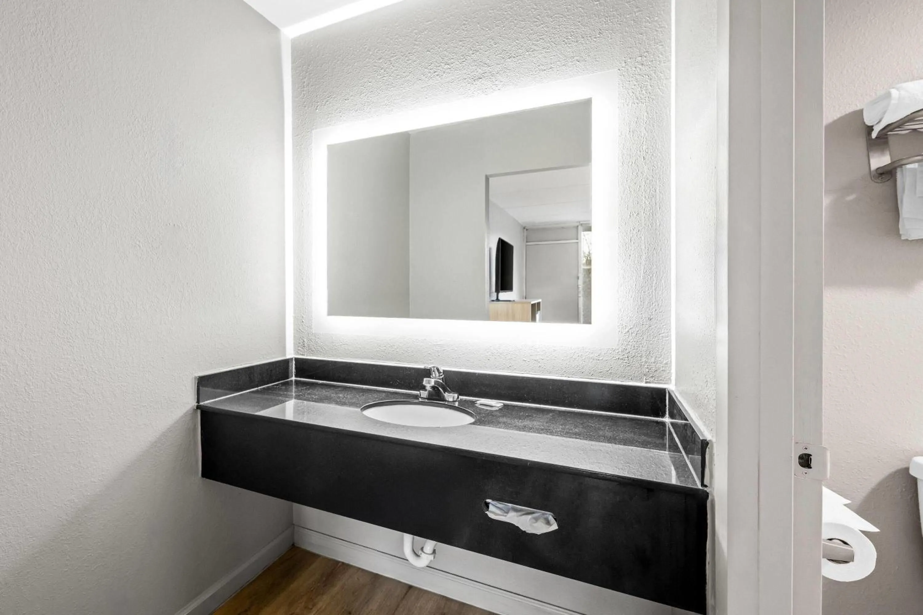 Bathroom in Super 8 by Wyndham Kingsport /I-81