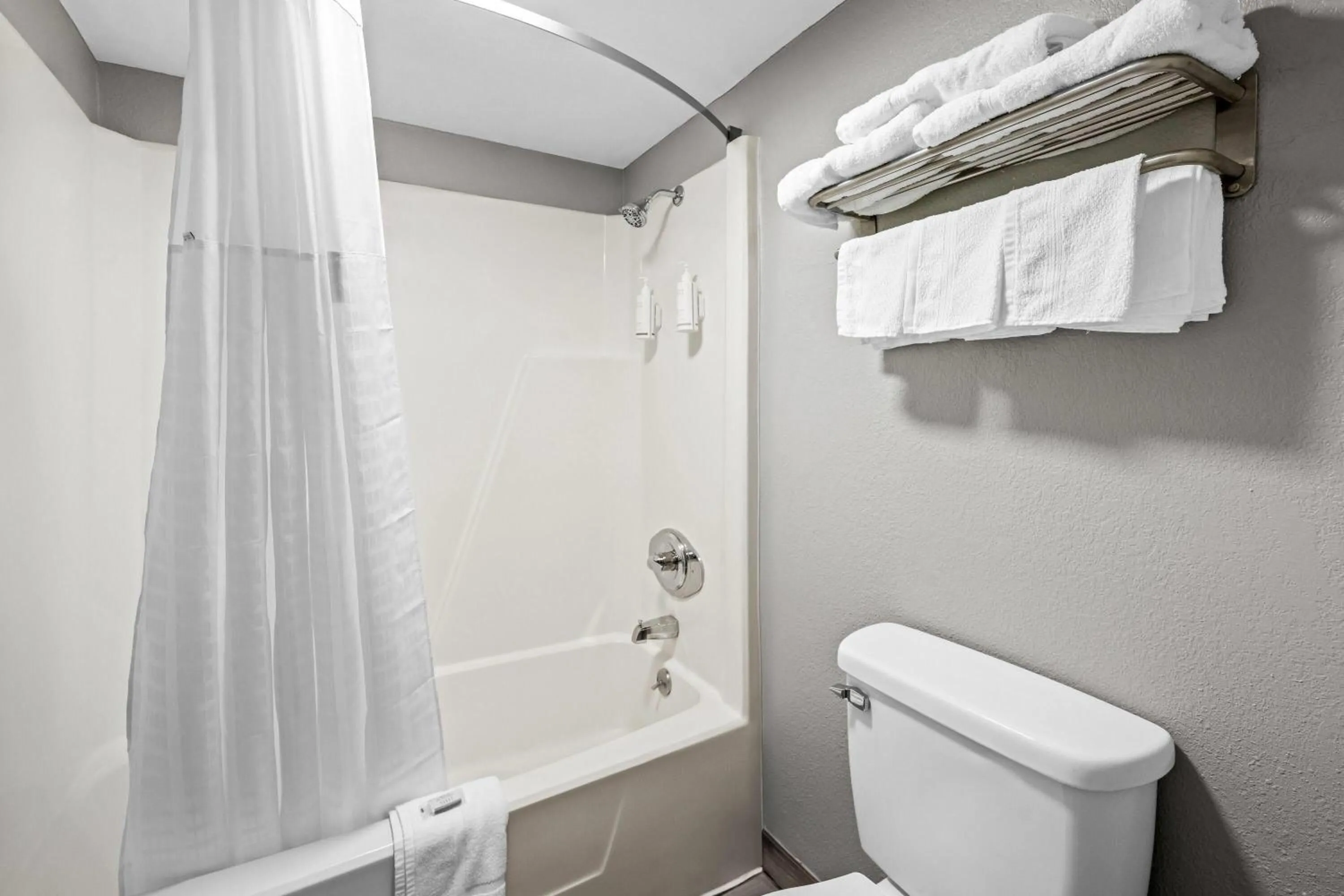 Bathroom in Super 8 by Wyndham Kingsport /I-81