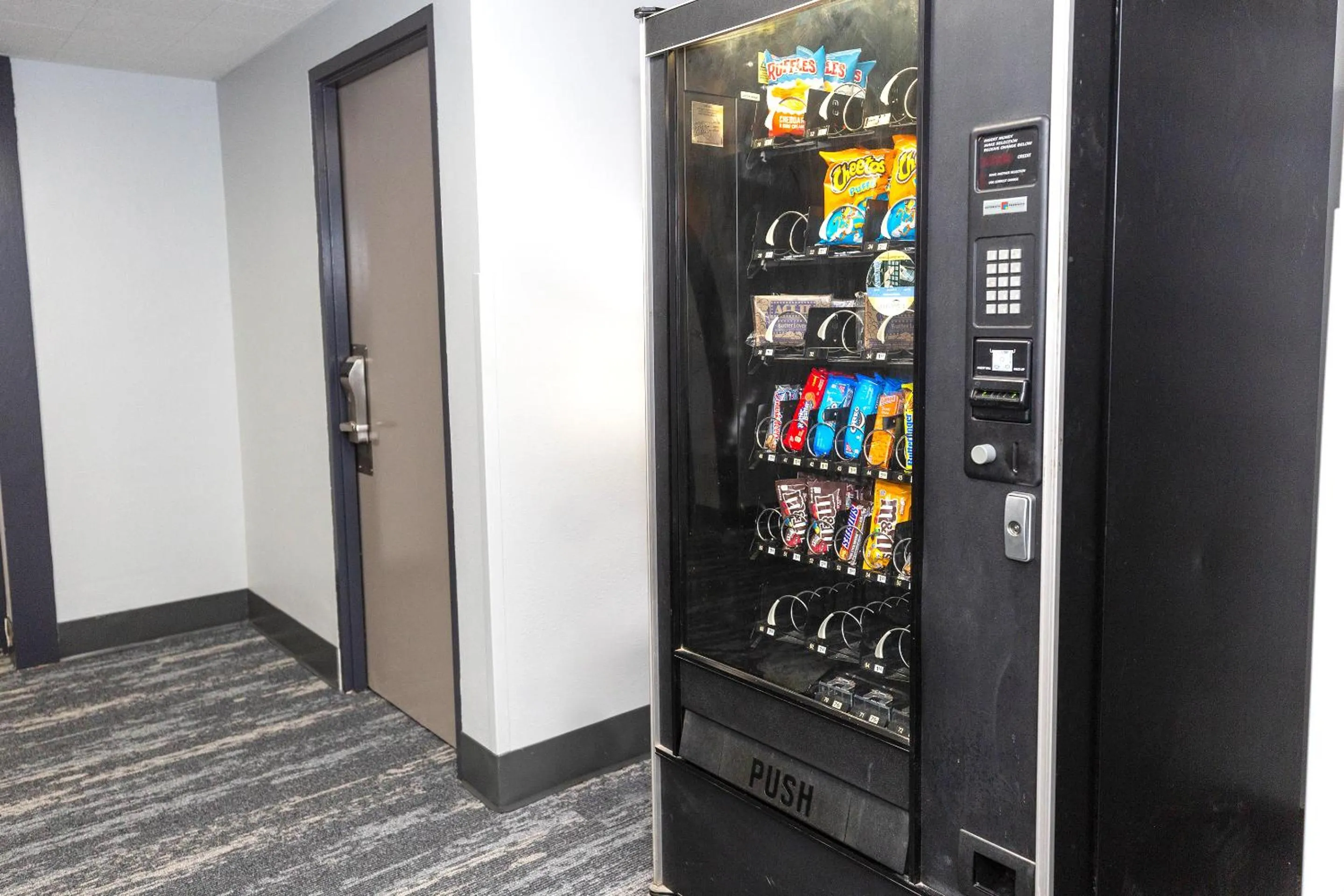 vending machine in Coratel Inn & Suites by Jasper Mankato