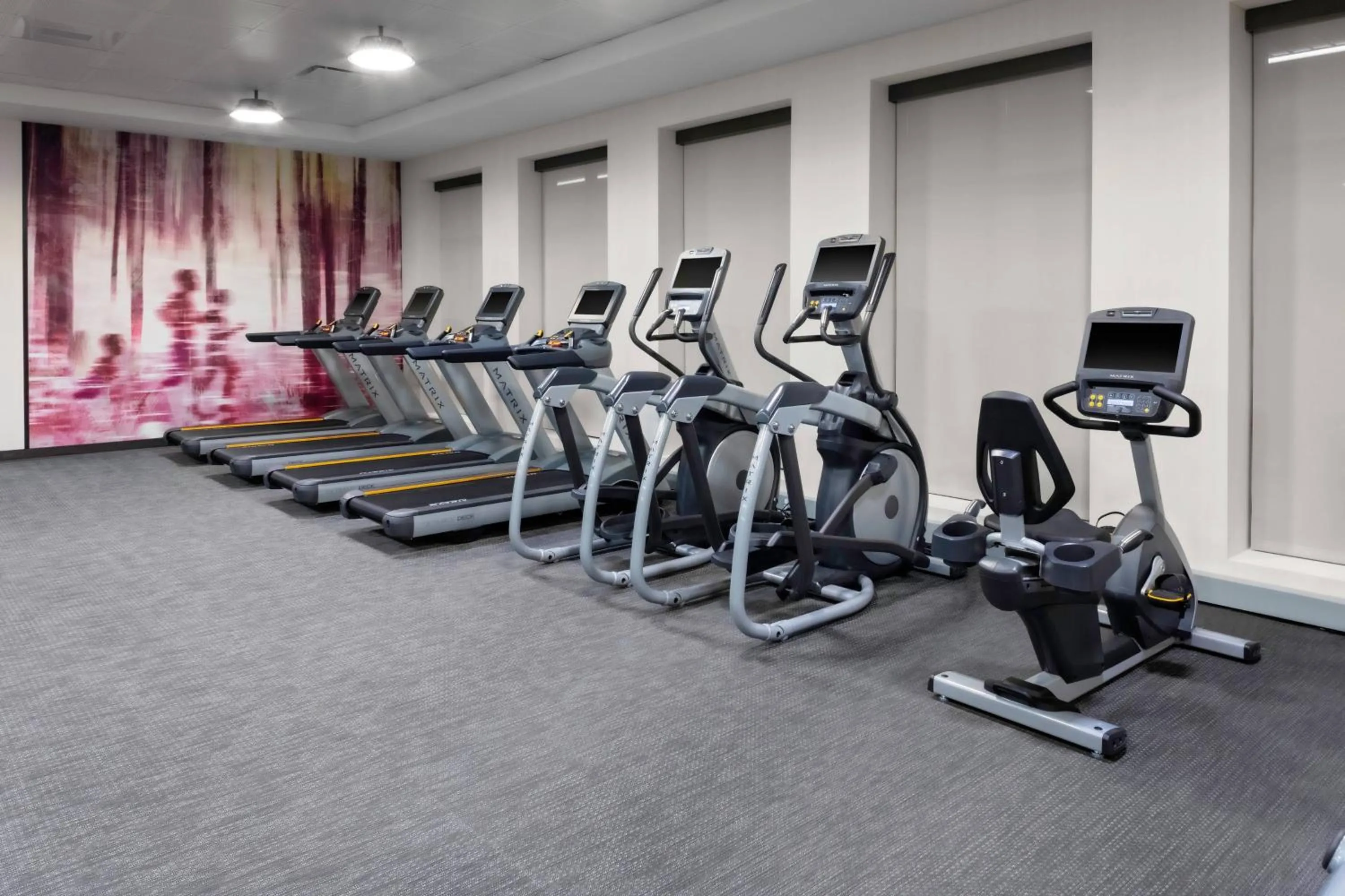 Fitness centre/facilities in Courtyard by Marriott East Lansing Okemos
