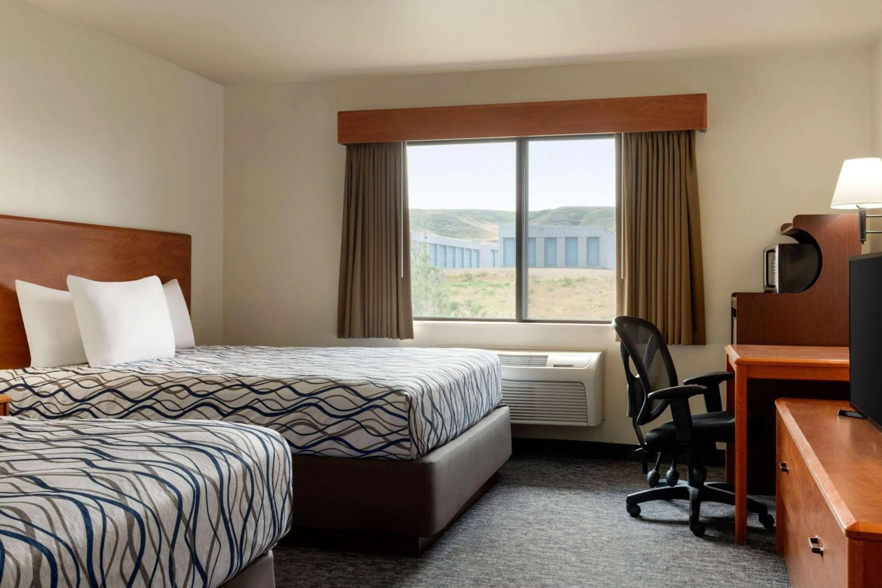 Photo of the whole room, Bed in AmericInn by Wyndham Havre
