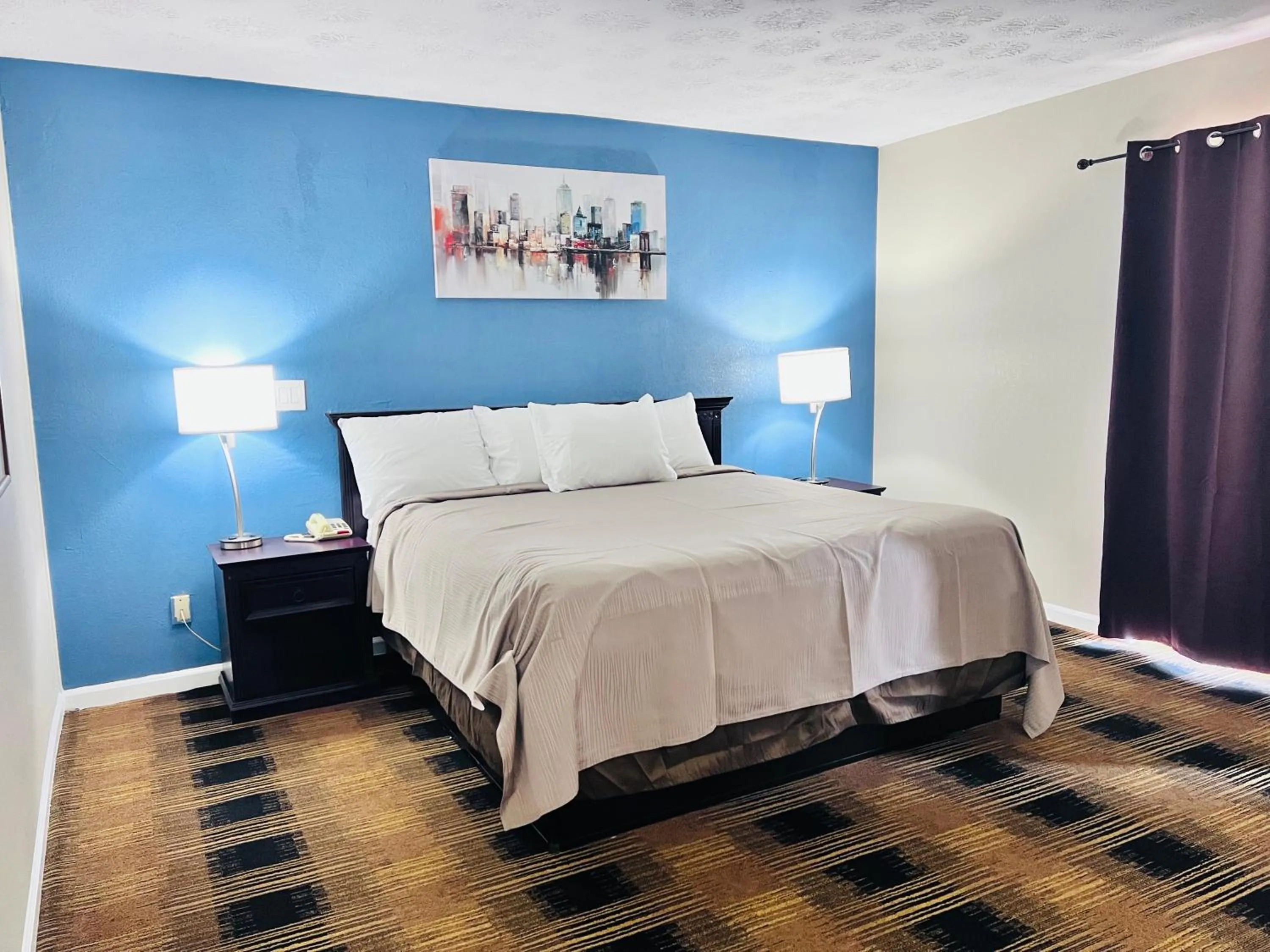 Bed in Knights Inn Dillard