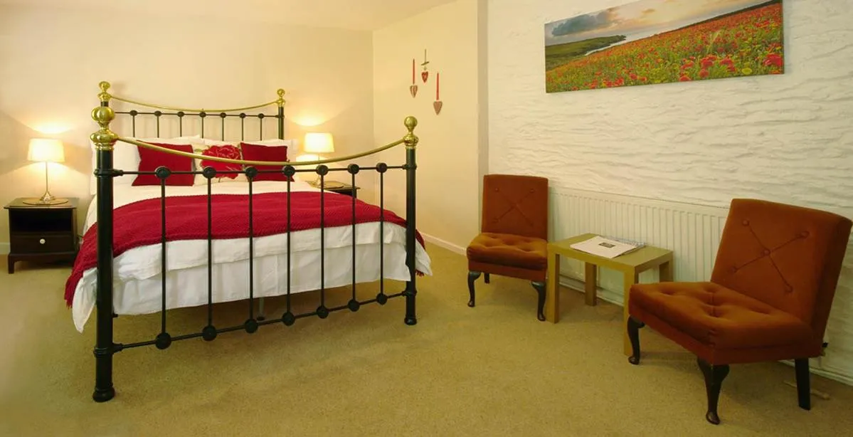 Bed in Natal House Bed & Breakfast