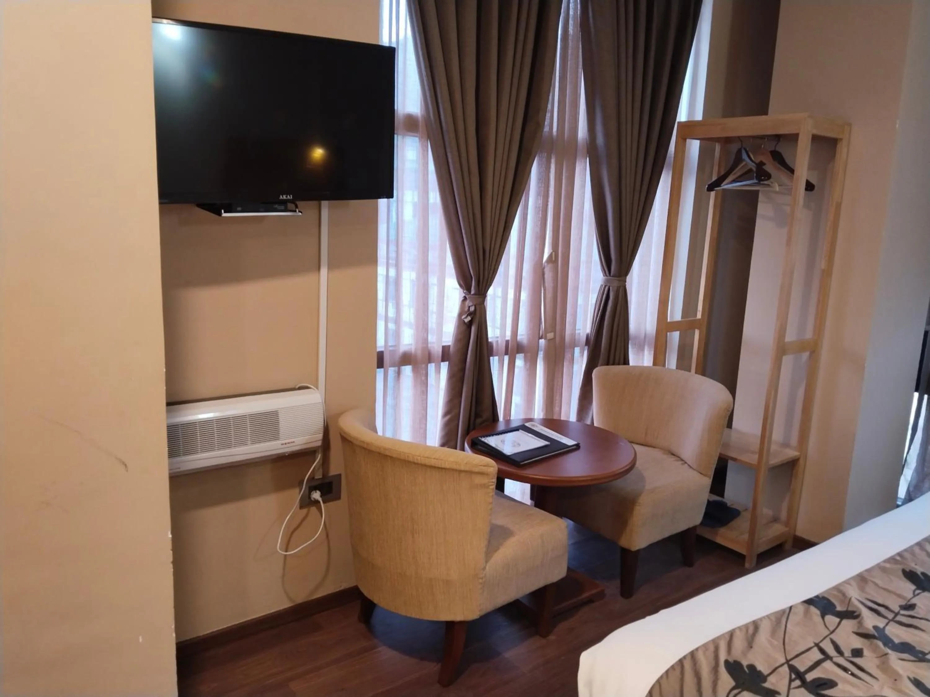 Seating area, Bed in Nirvana Inn