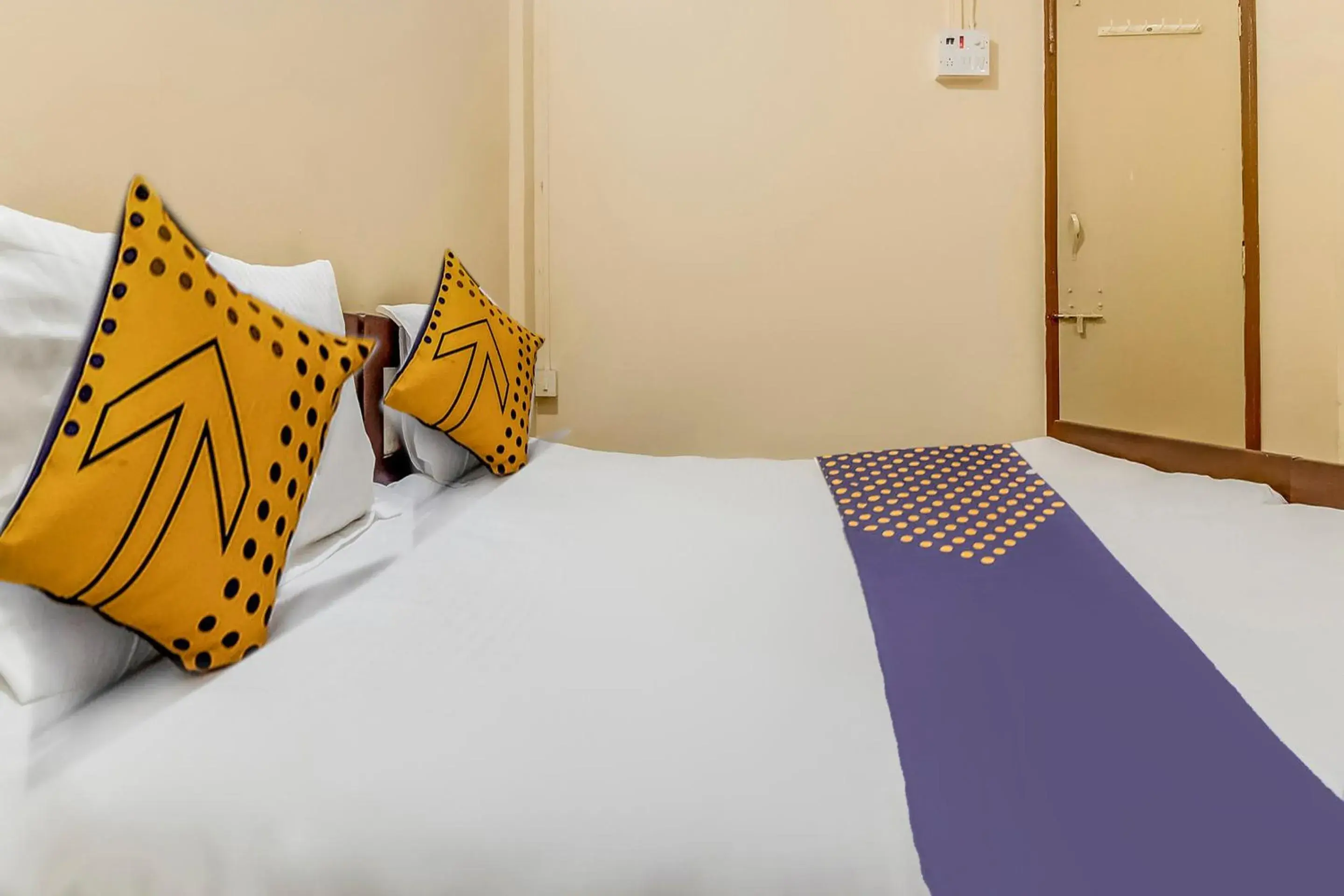 Bedroom in Hotel O New Ushakal Lodging & Boarding Bedroom in Hotel O New Ushakal Lodging & Boarding