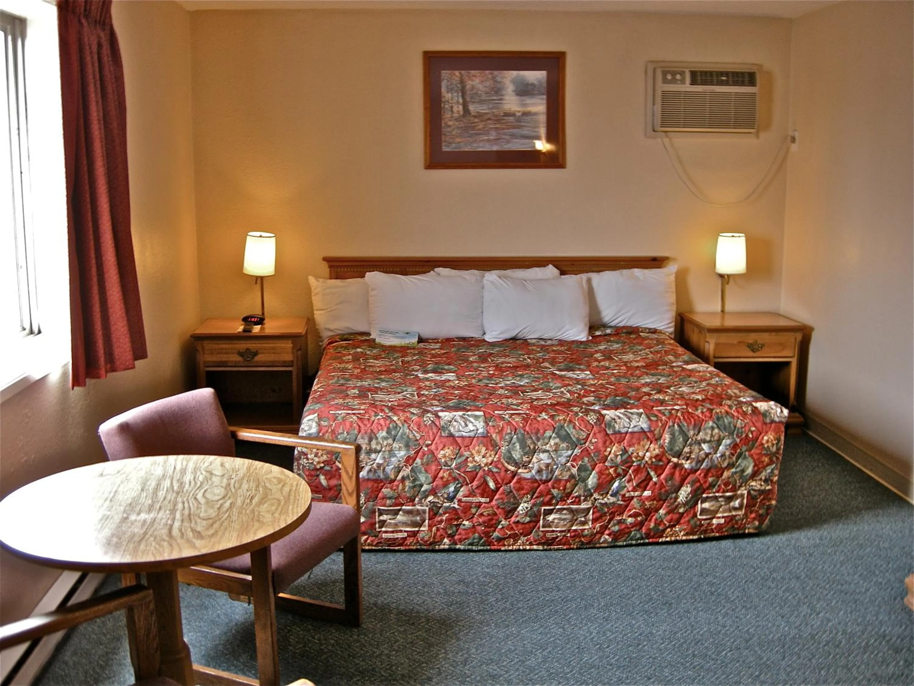 Seating area, Bed in Days Inn by Wyndham Burns