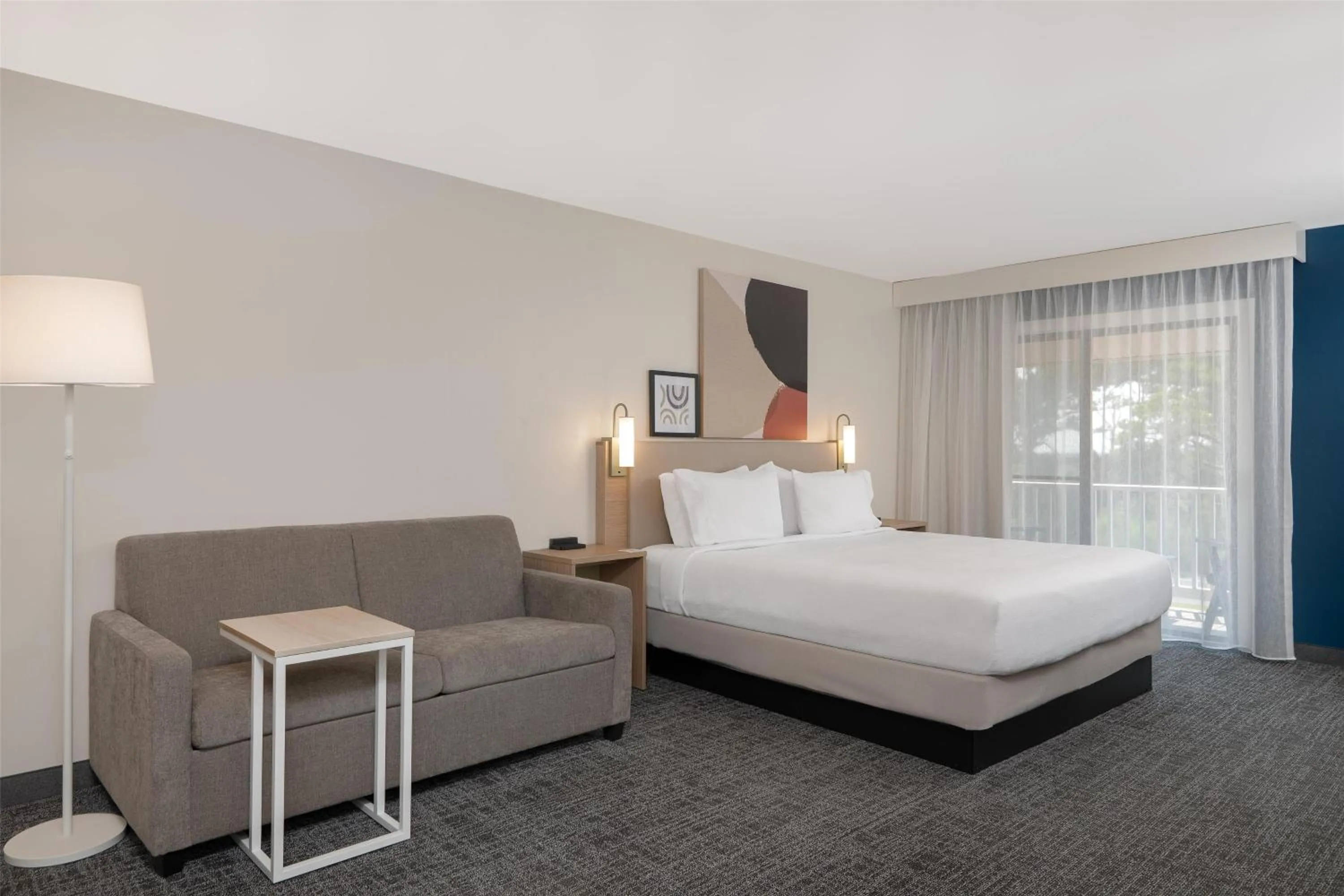 Living room, Bed in Spark by Hilton Chincoteague Island