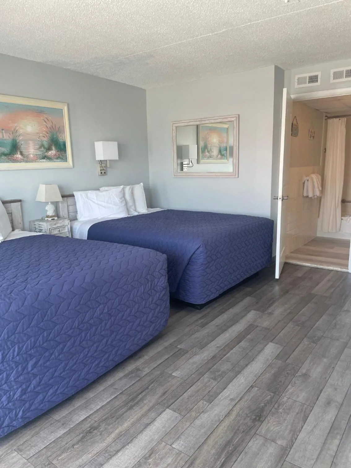 Bed in Acacia Beachfront Resort