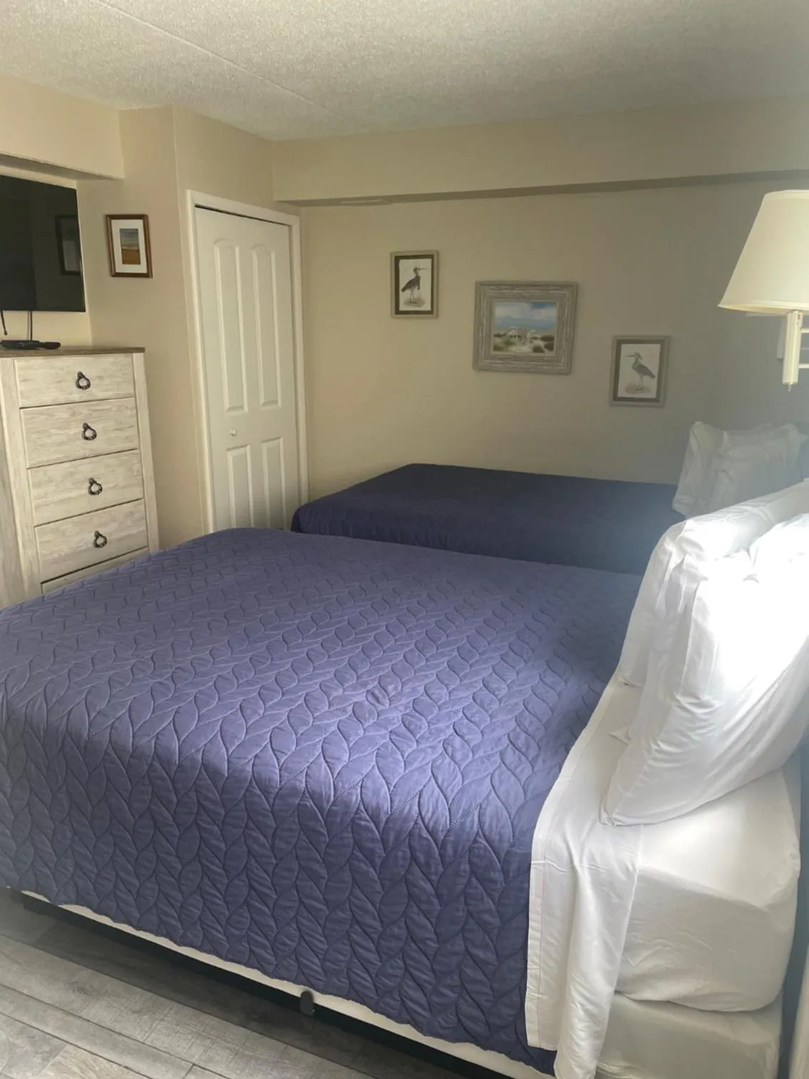 Bed in Acacia Beachfront Resort