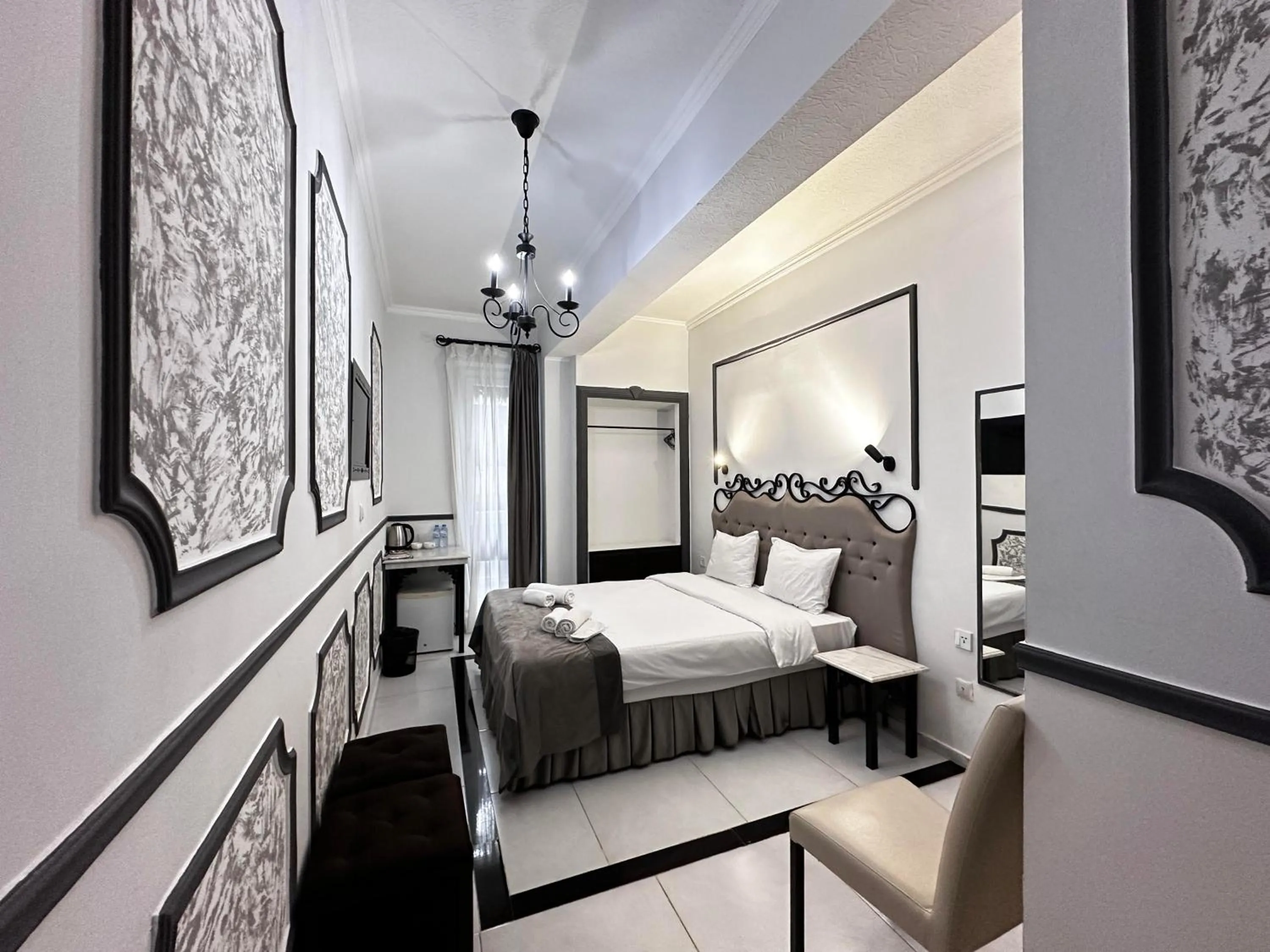 Photo of the whole room, Bed in The One Boutique