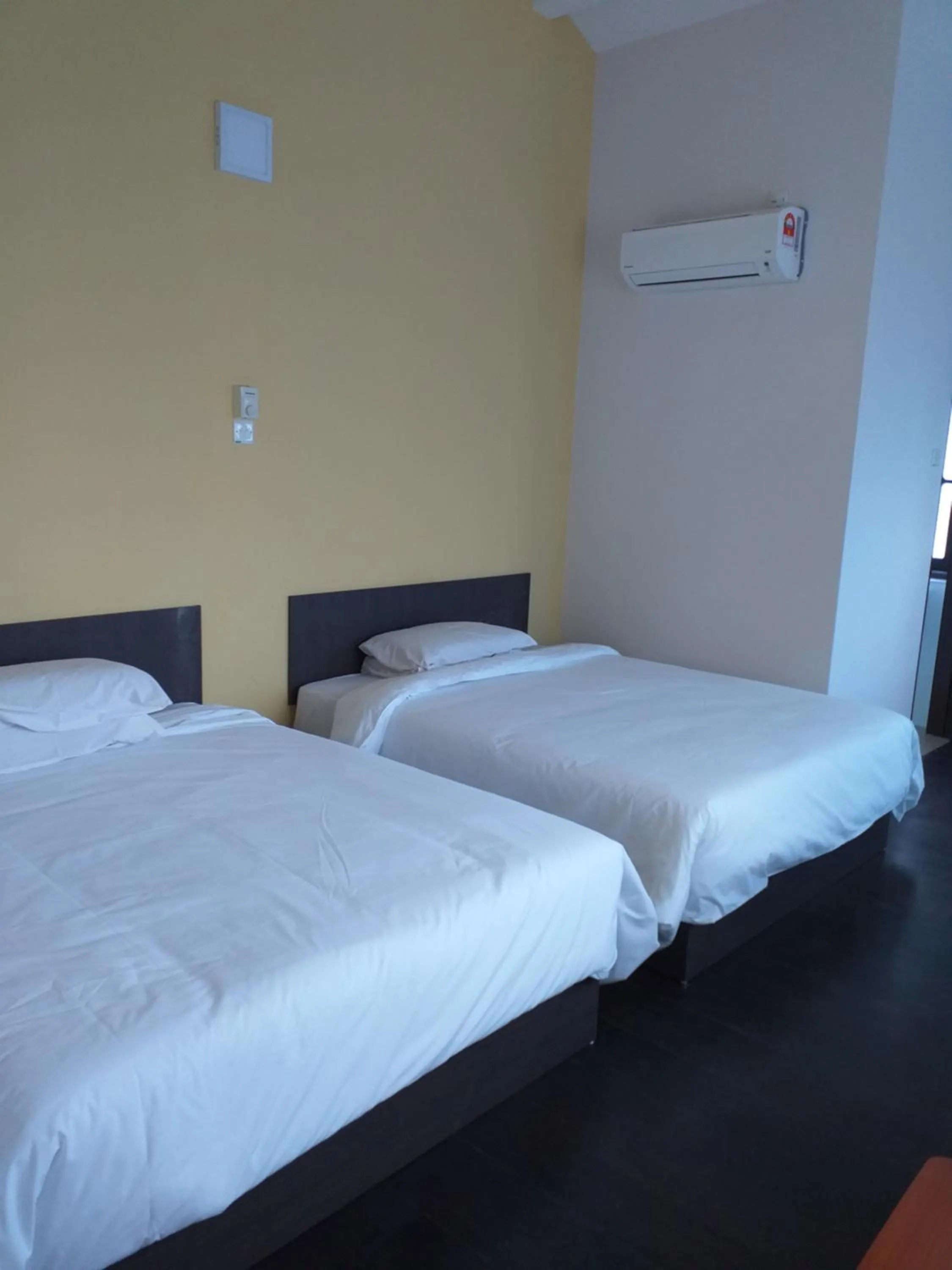 Bed in Hotel Peking