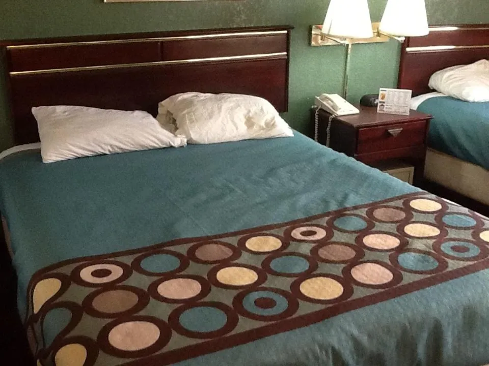 Bed in Super 8 by Wyndham Kennett