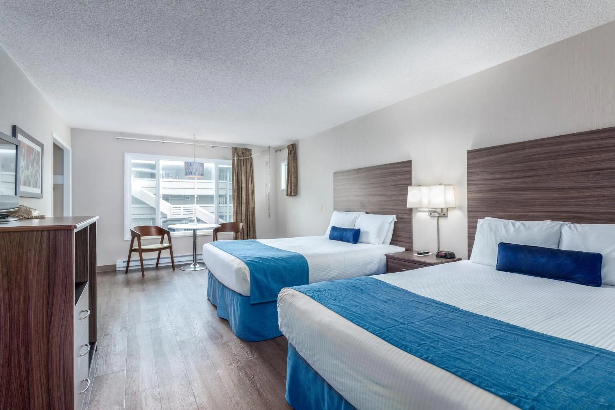 Bed in Seashore Inn on the Beach Seaside