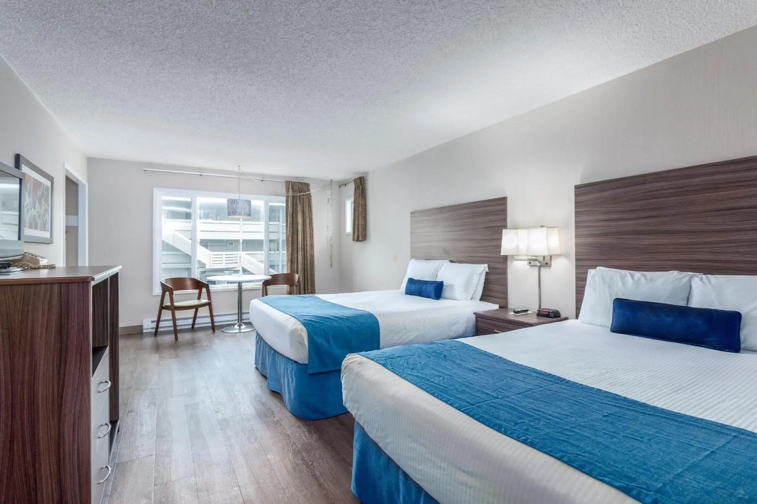 Two Queen Beds Value Room - Non View in Seashore Inn on the Beach Seaside Two Queen Beds Value Room - Non View in Seashore Inn on the Beach Seaside