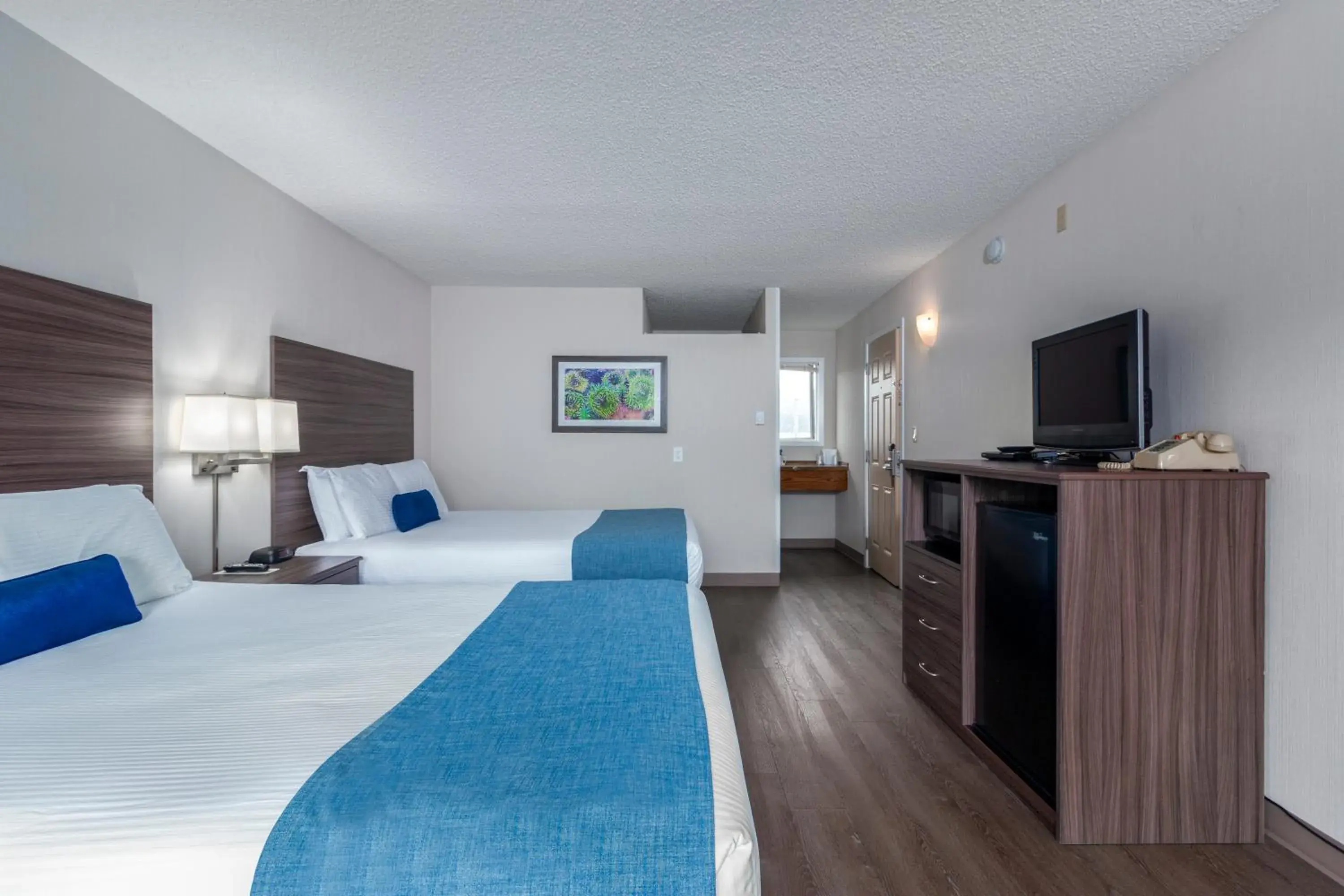 Two Queen Beds Value Room - Non View in Seashore Inn on the Beach Seaside Two Queen Beds Value Room - Non View in Seashore Inn on the Beach Seaside