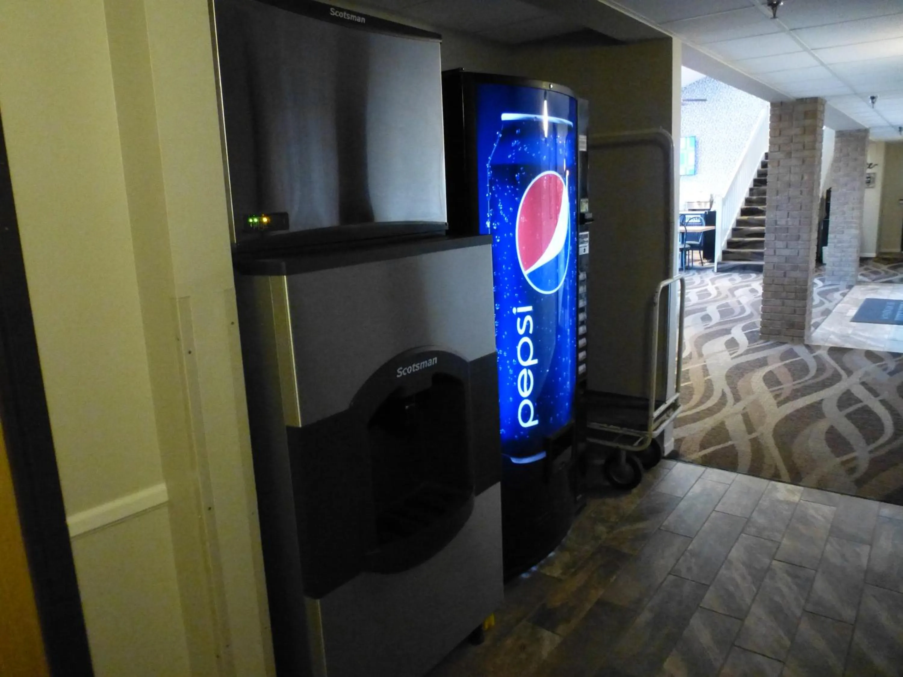 vending machine, Bed in AmericInn by Wyndham Mitchell