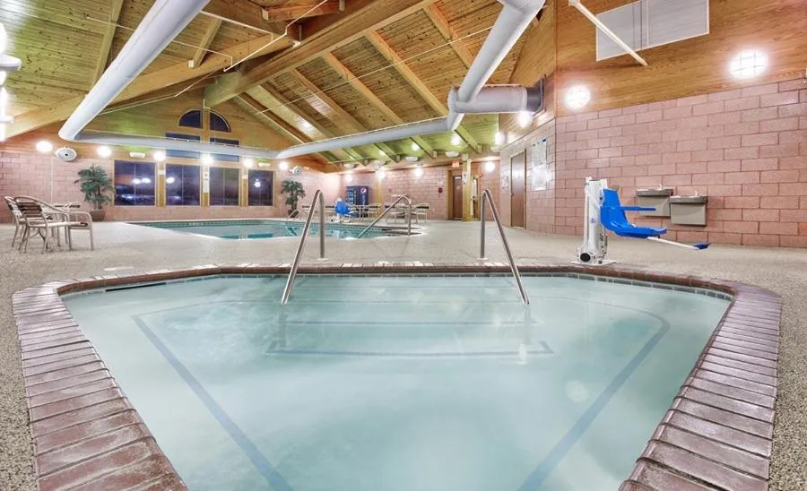 Swimming pool in AmericInn by Wyndham Vidalia