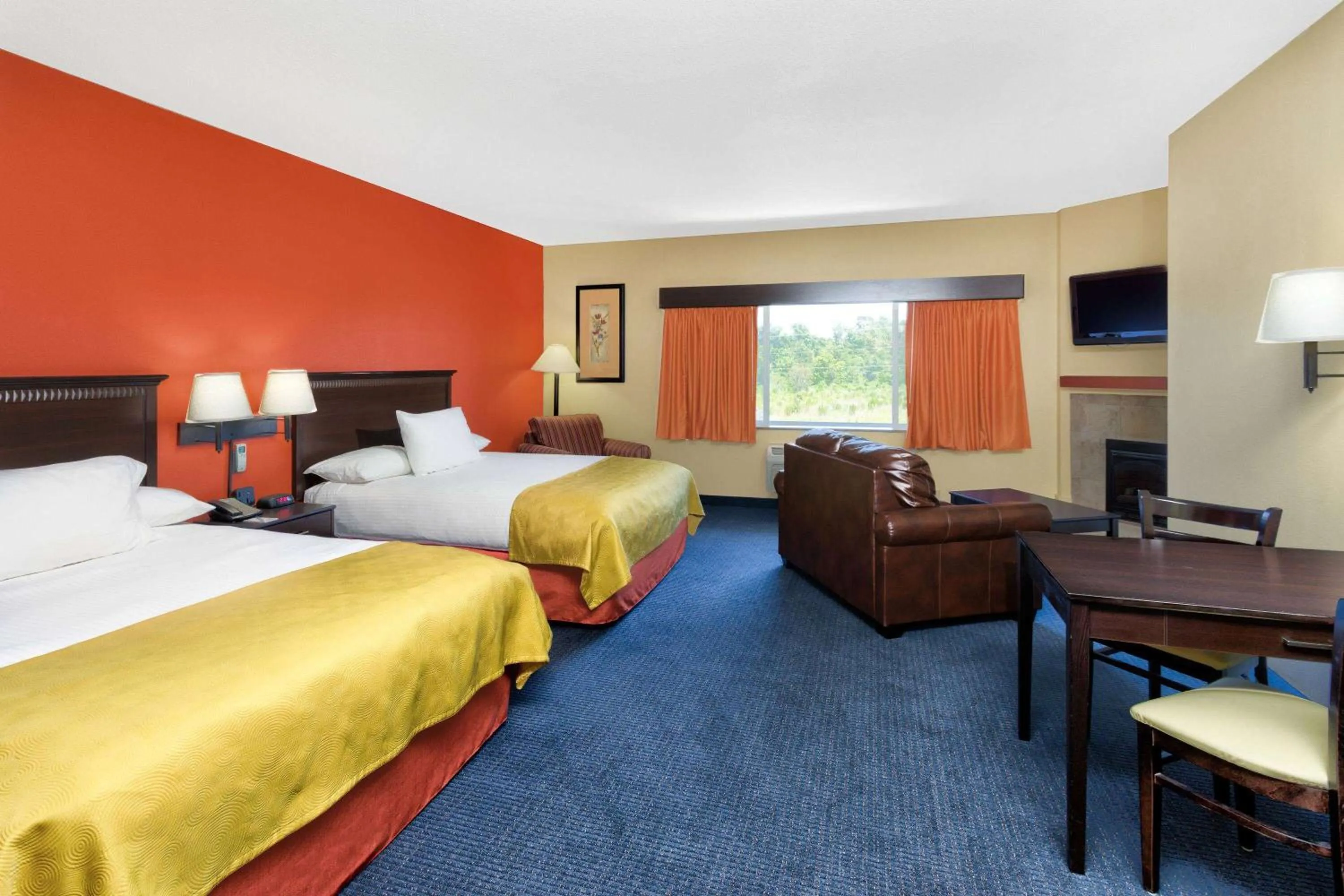 Bed in AmericInn by Wyndham Vidalia