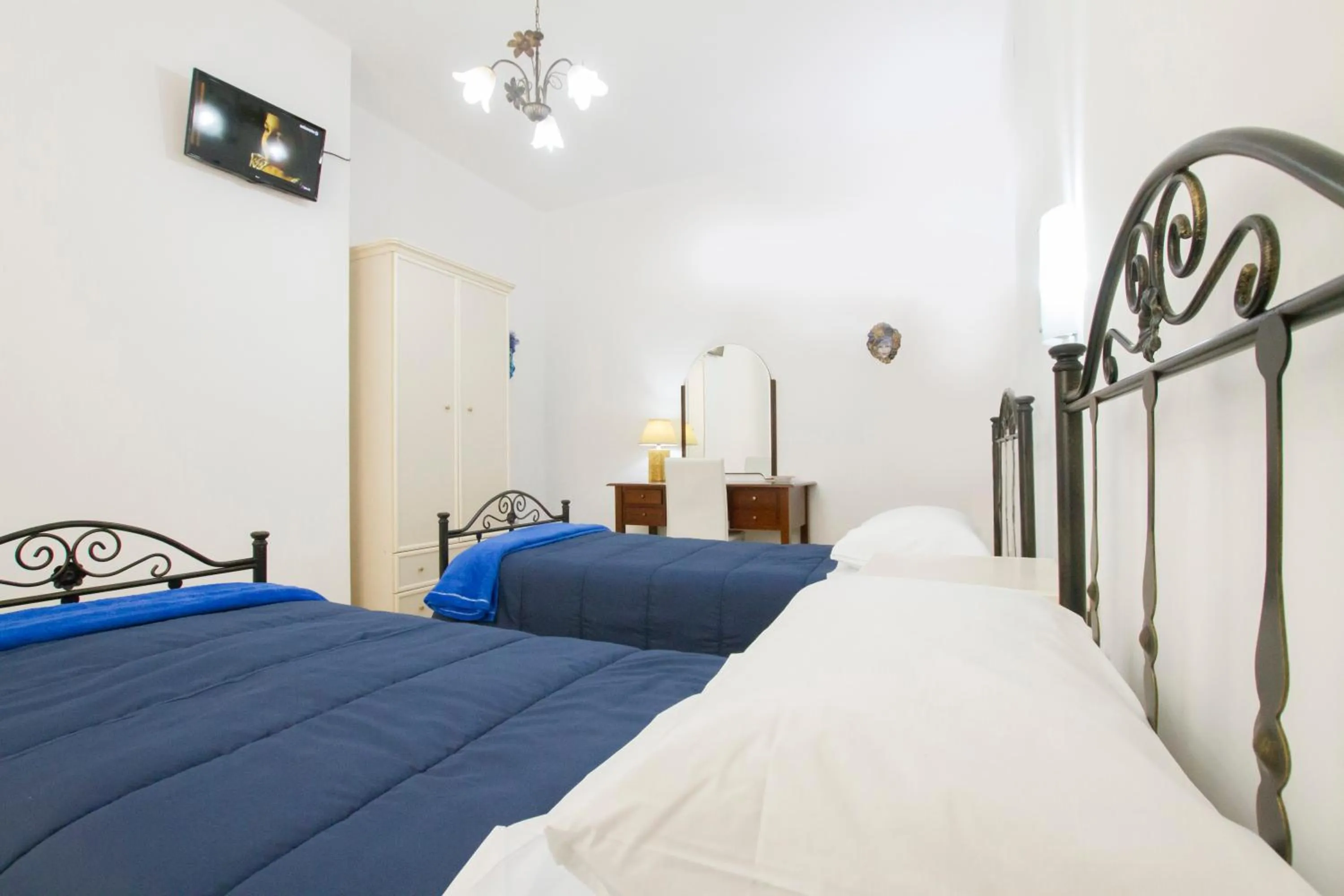 Bed in Le Maschere B&B