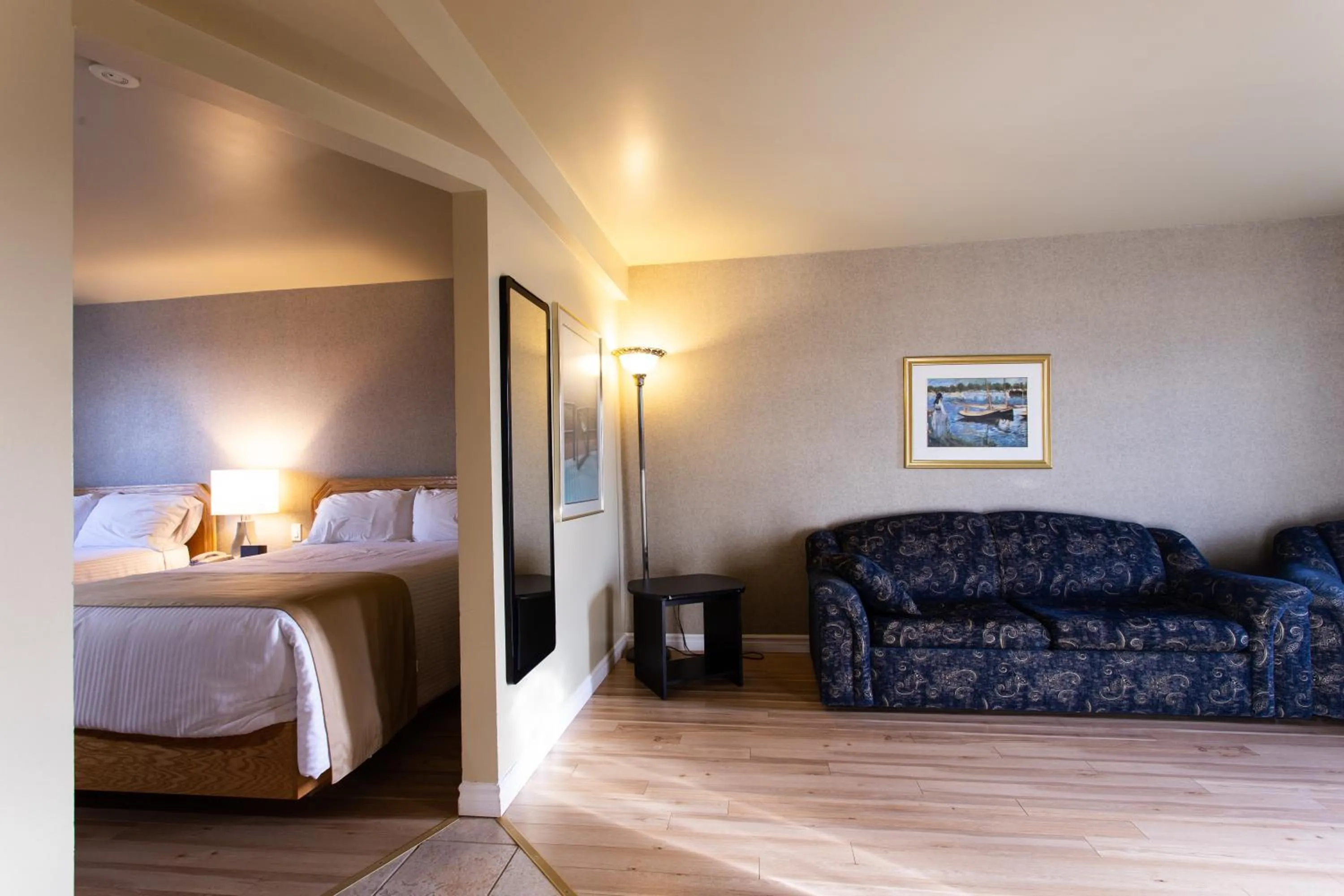 Bed in Motel Grand-Pré Inc