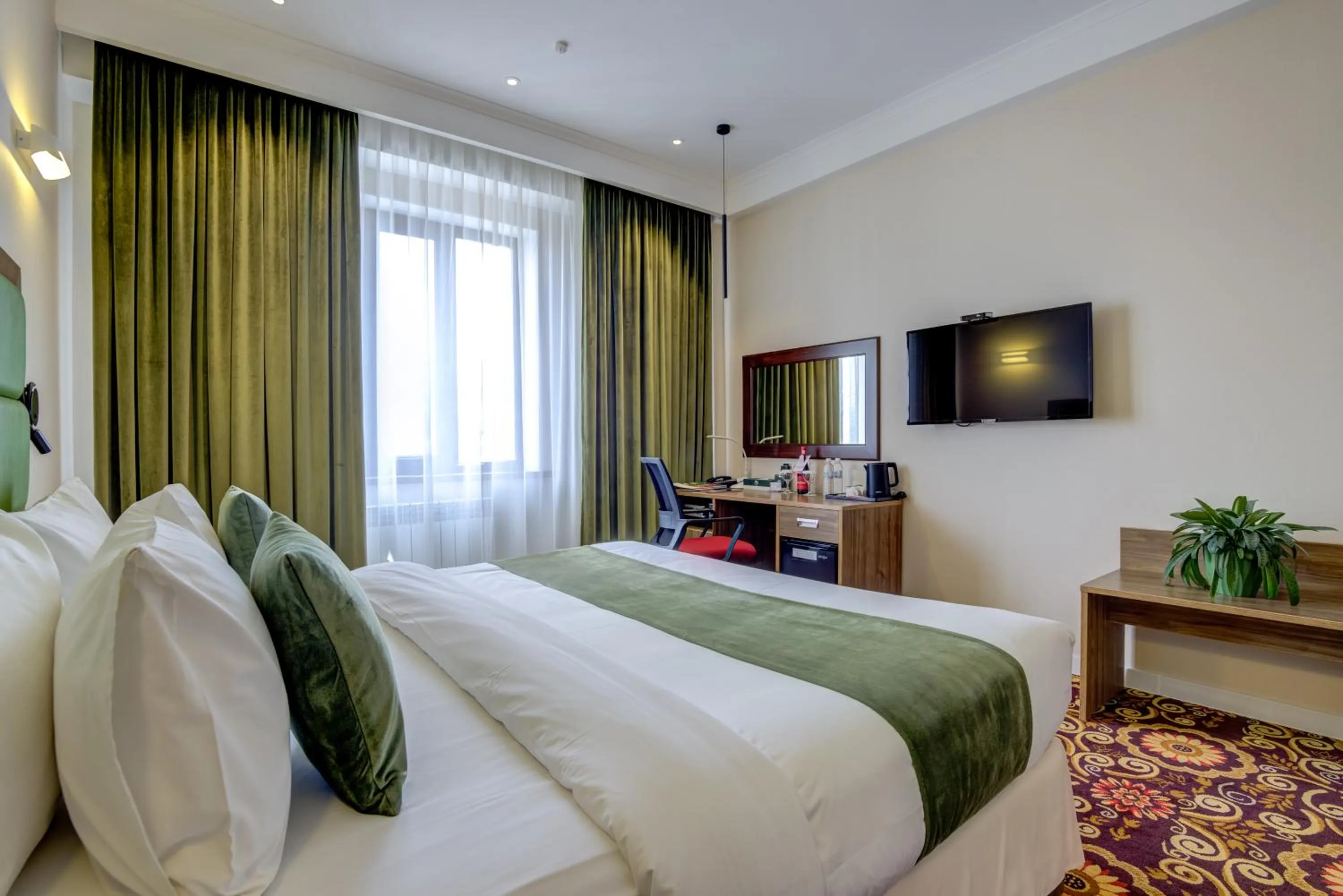 Bed in Garden Hotel & SPA