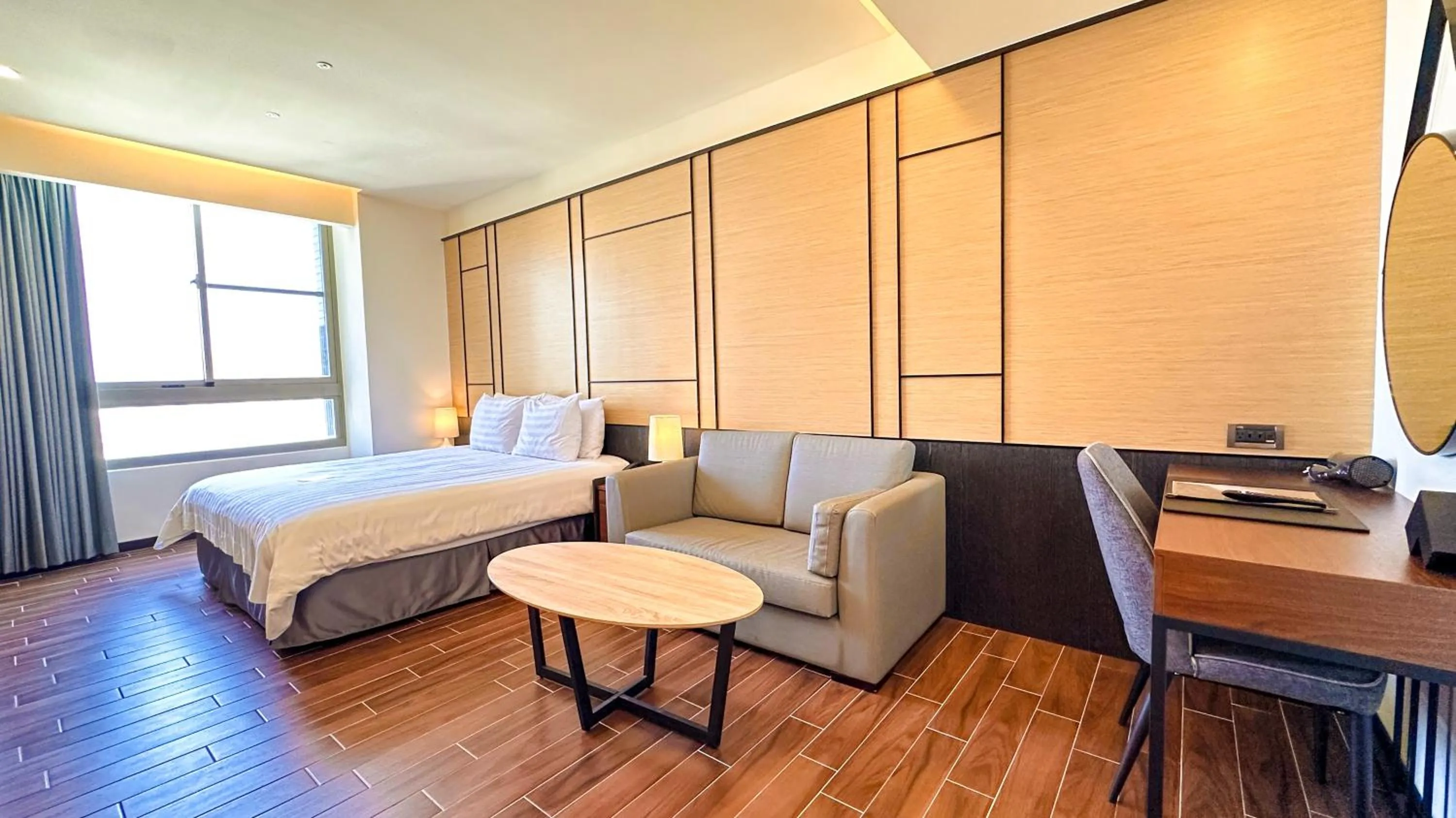 Living room, Bed in Hotel A
