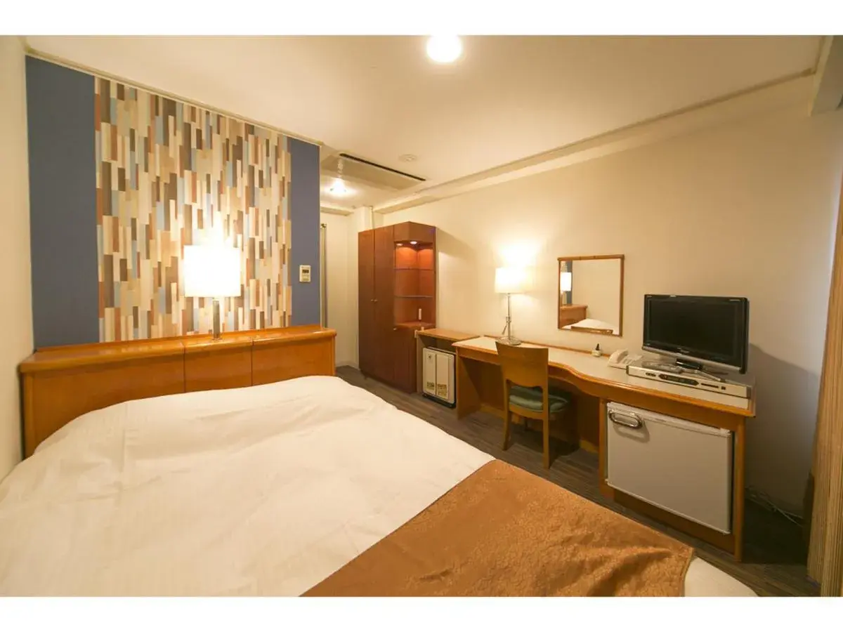 Bed in Hyper-inn Takamatsu Ekimae Bed in Hyper-inn Takamatsu Ekimae