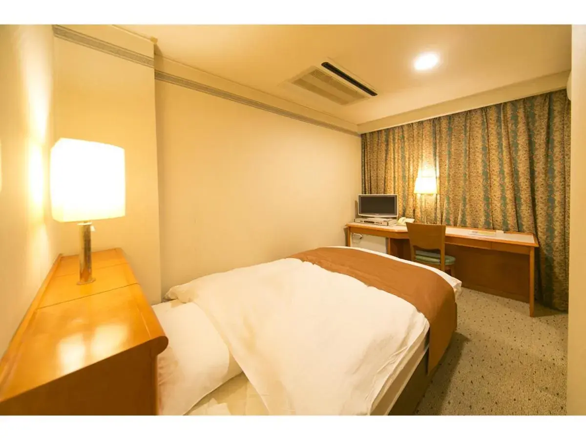 Bed in Hyper-inn Takamatsu Ekimae Bed in Hyper-inn Takamatsu Ekimae