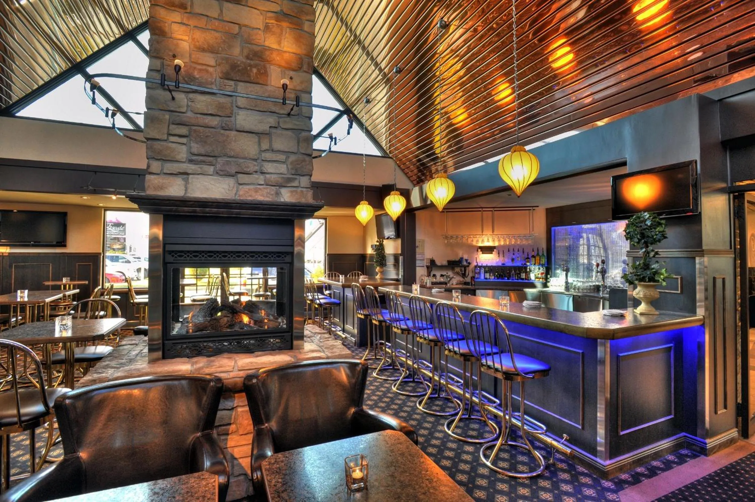 Lounge or bar in L'Escale Hôtel Suites