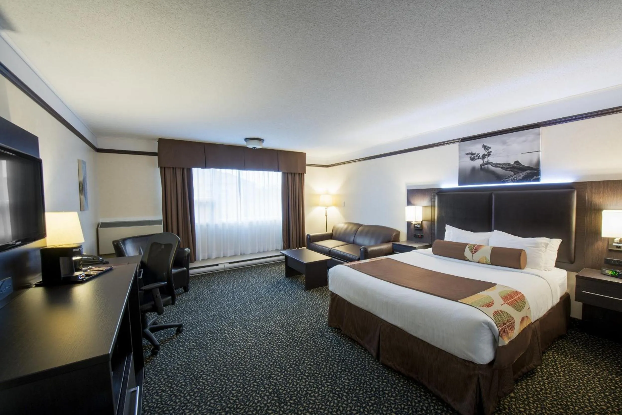 Bedroom, Bed in L'Escale Hôtel Suites