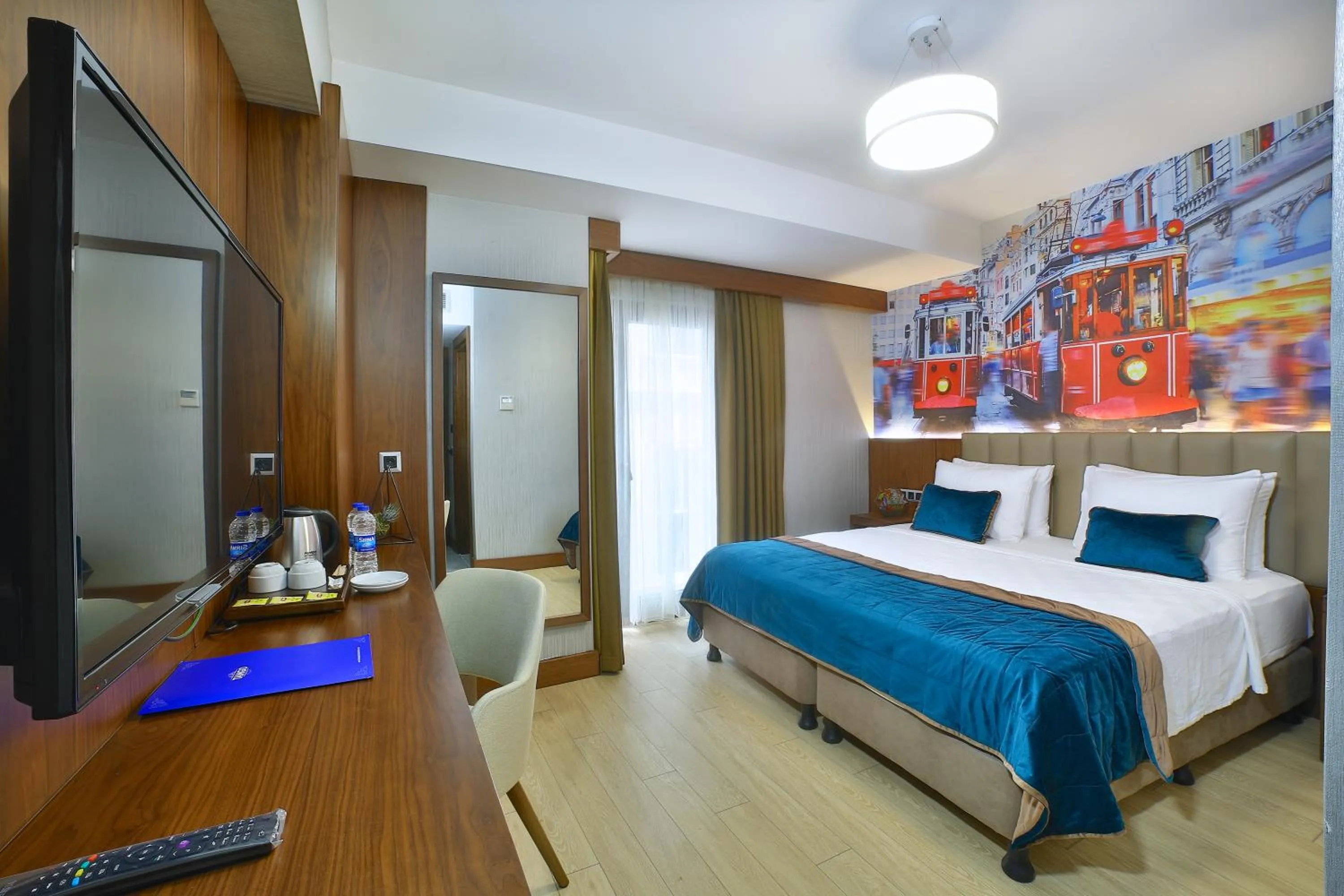 Communal lounge/ TV room, Bed in The Tango Hotel Taksim