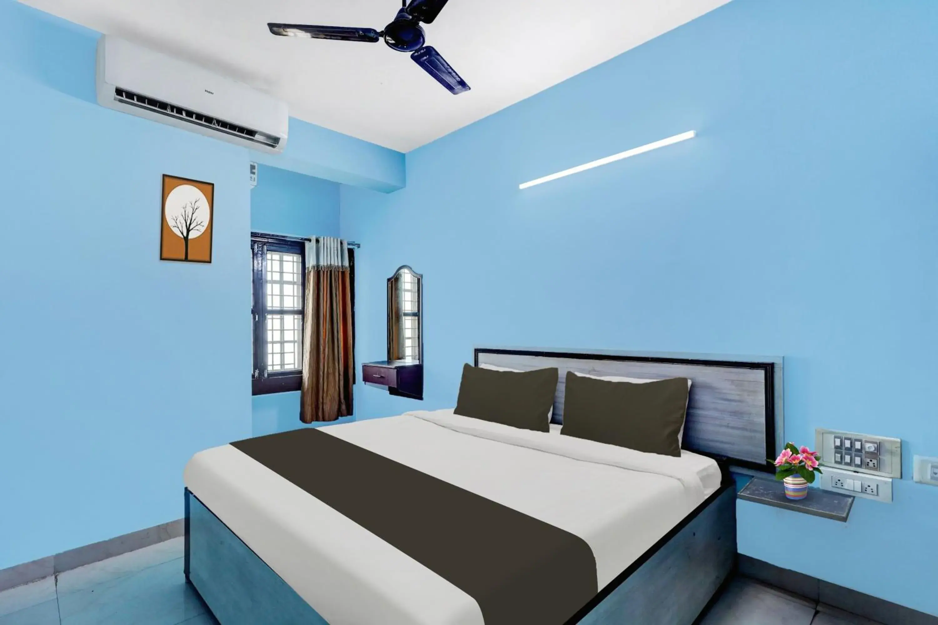 Bedroom, Bed in Super Hotel O Kennedy Nagar Near Railway Station formerly Jayalakshmi Residency Bedroom, Bed in Super Hotel O Kennedy Nagar Near Railway Station formerly Jayalakshmi Residency