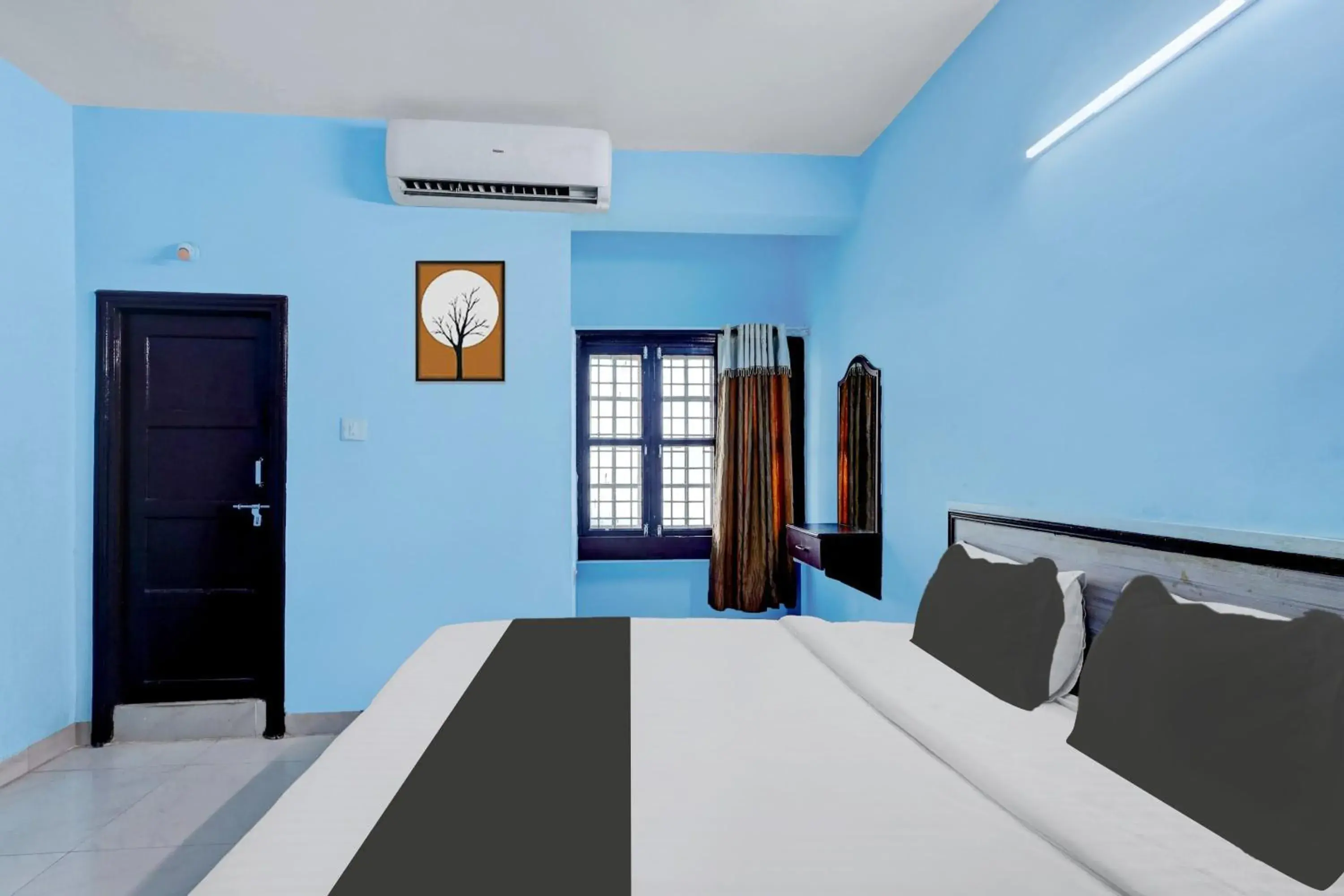 Bedroom, Bed in Super Hotel O Kennedy Nagar Near Railway Station formerly Jayalakshmi Residency Bedroom, Bed in Super Hotel O Kennedy Nagar Near Railway Station formerly Jayalakshmi Residency