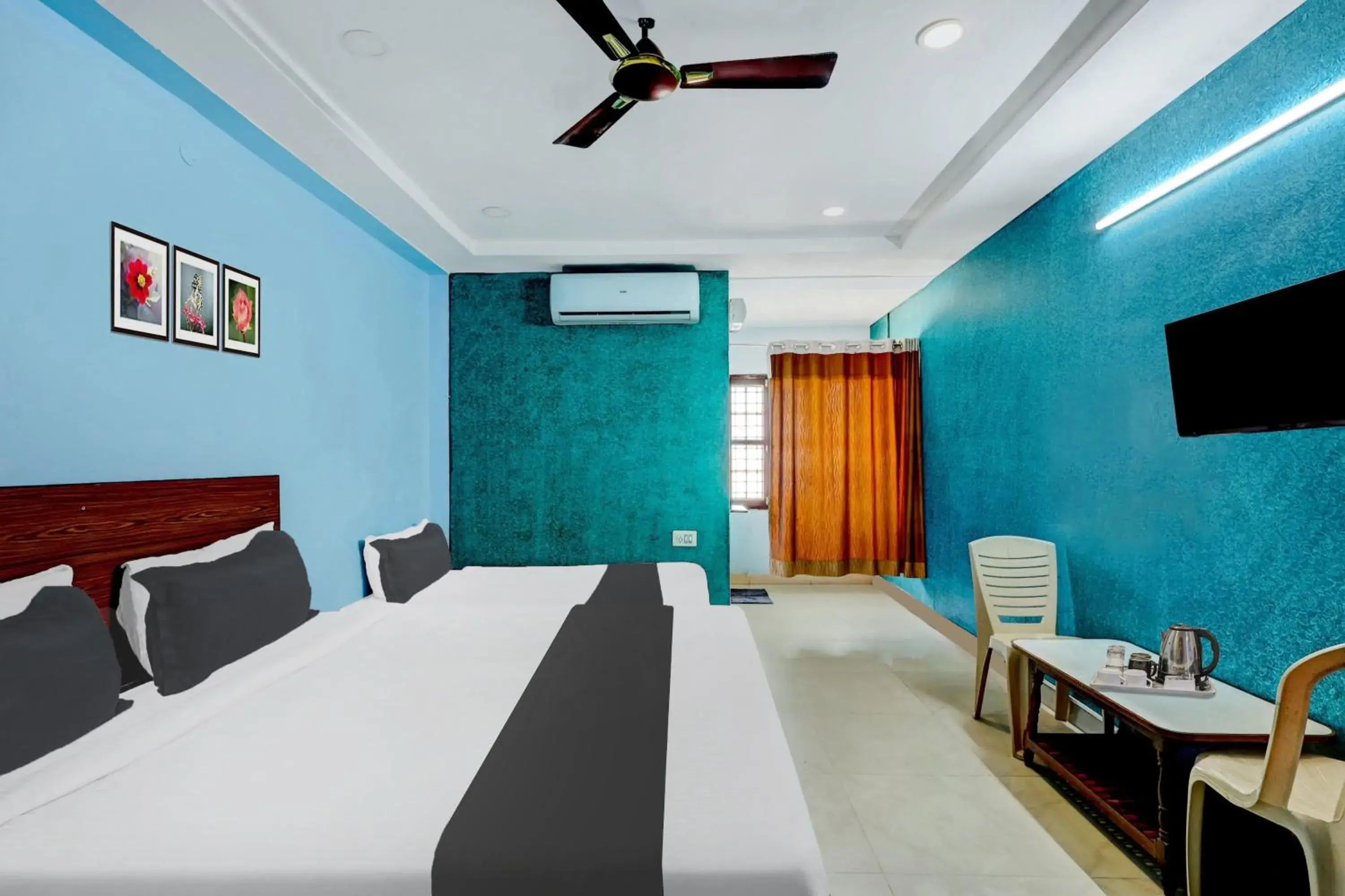 Bedroom, Bed in Super Hotel O Kennedy Nagar Near Railway Station formerly Jayalakshmi Residency Bedroom, Bed in Super Hotel O Kennedy Nagar Near Railway Station formerly Jayalakshmi Residency