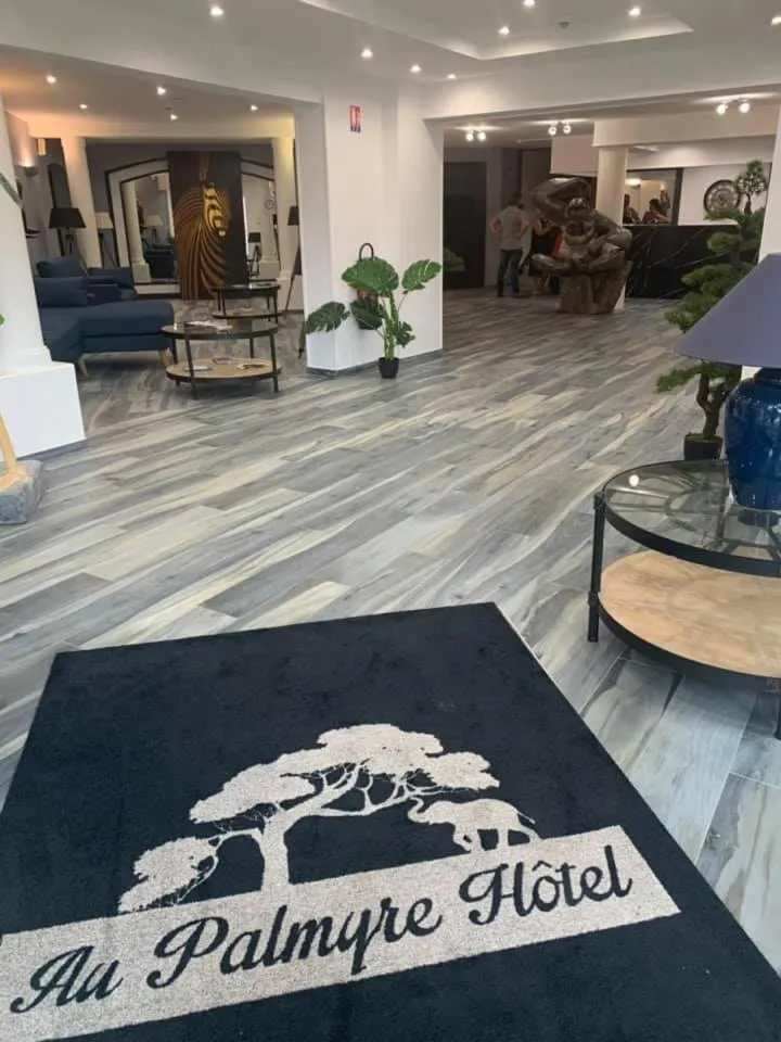 Lobby or reception in Au Palmyre Hôtel