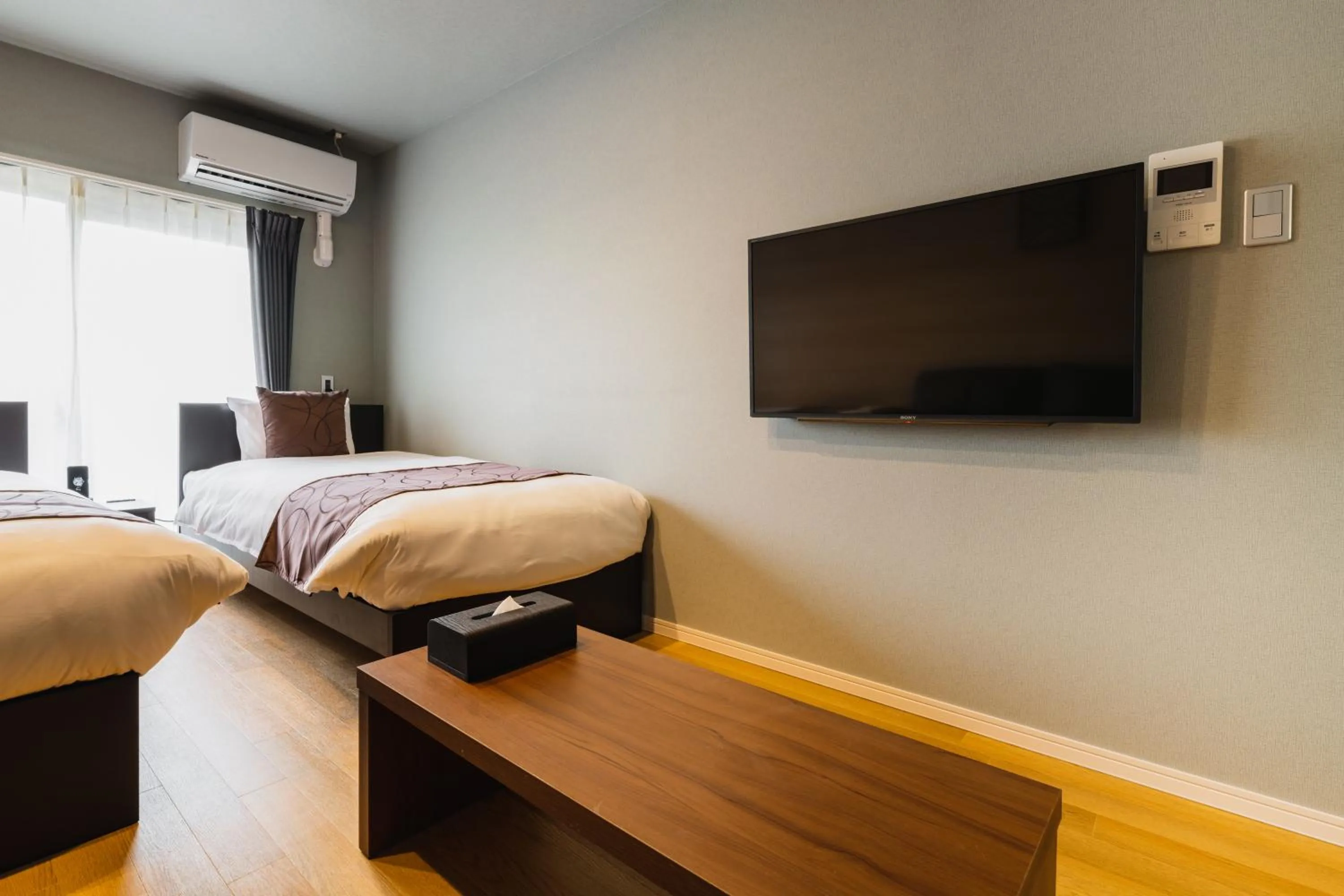 Photo of the whole room, Bed in Cocolie BEPPU