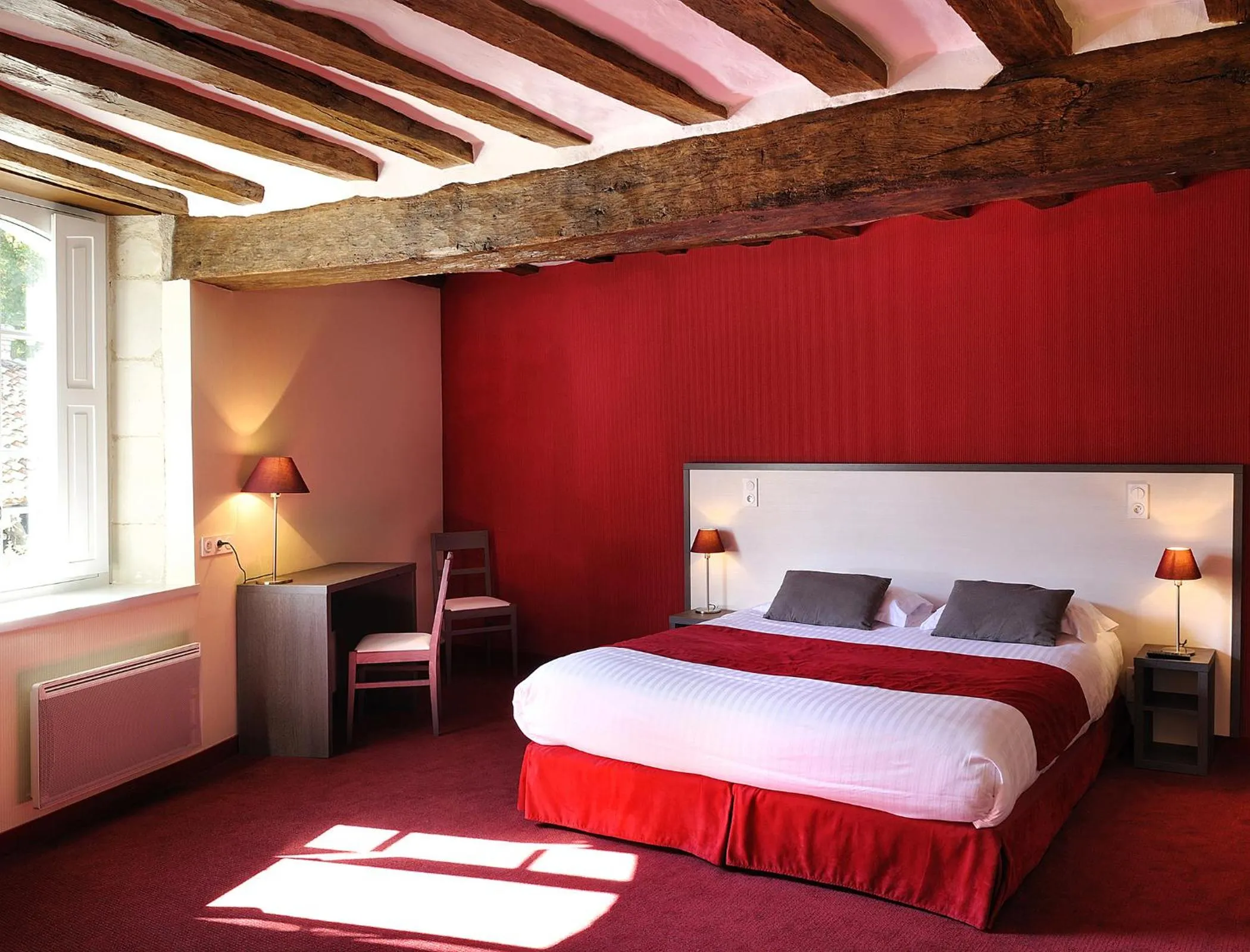 Photo of the whole room, Bed in Logis Hôtel Restaurant Le Puits Doré
