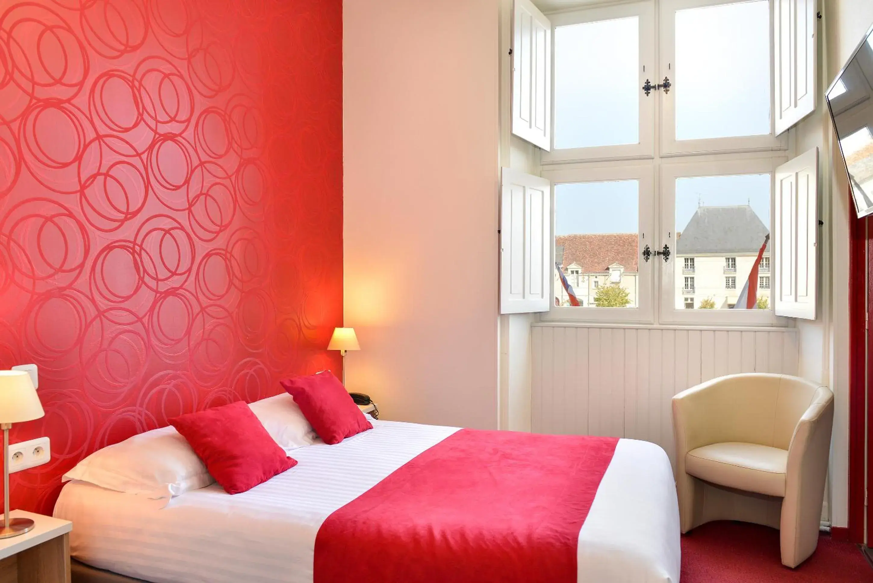 Bed in Logis Hôtel Restaurant Le Puits Doré Bed in Logis Hôtel Restaurant Le Puits Doré