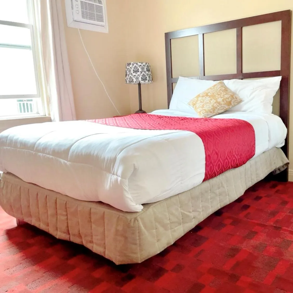 Bed in Motel Saint-Hilaire