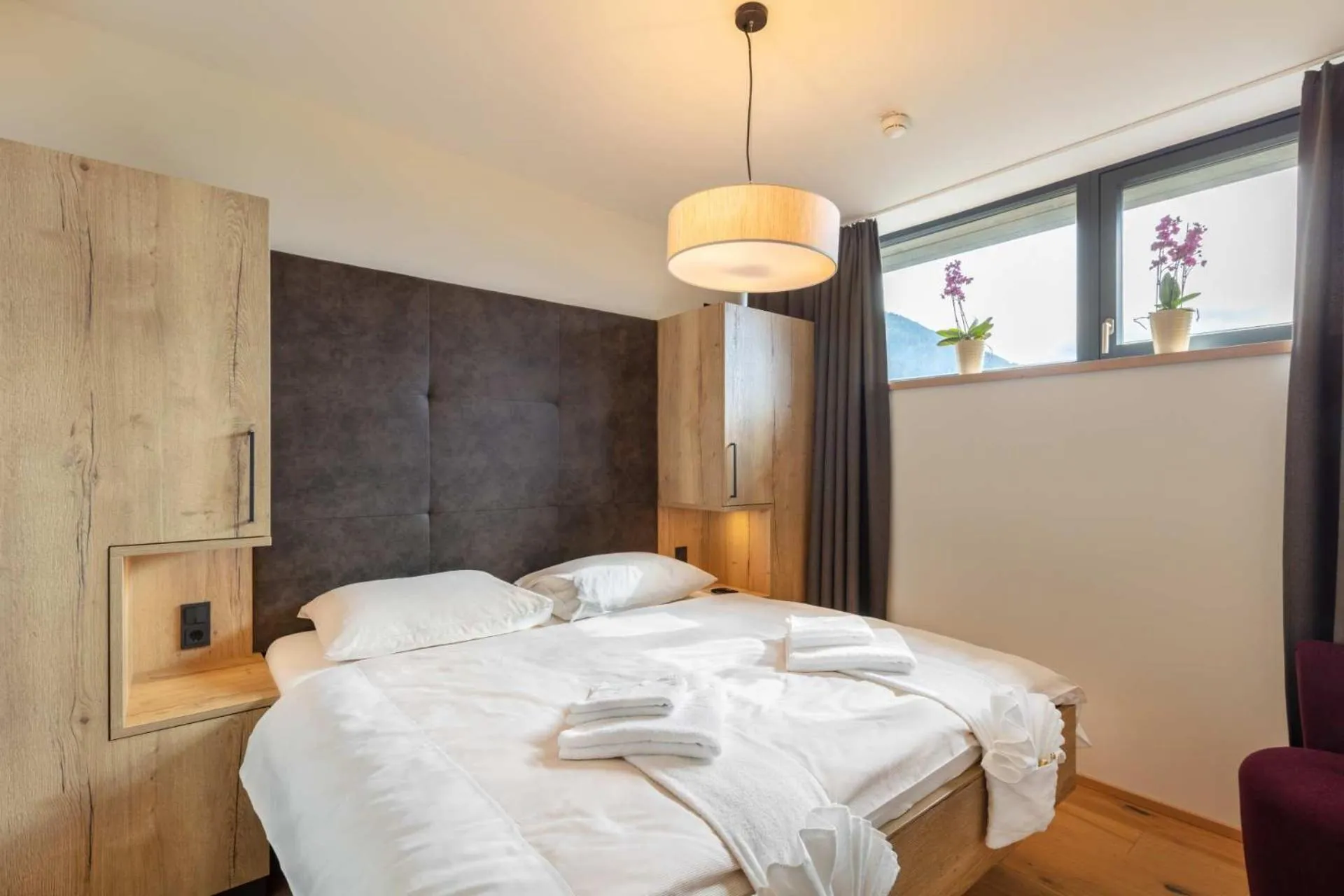 Bedroom, Bed in Emma Deluxe Aparthotel aircondition in summer & ganzjährig beheizter Außenpool direkt beim Skibus