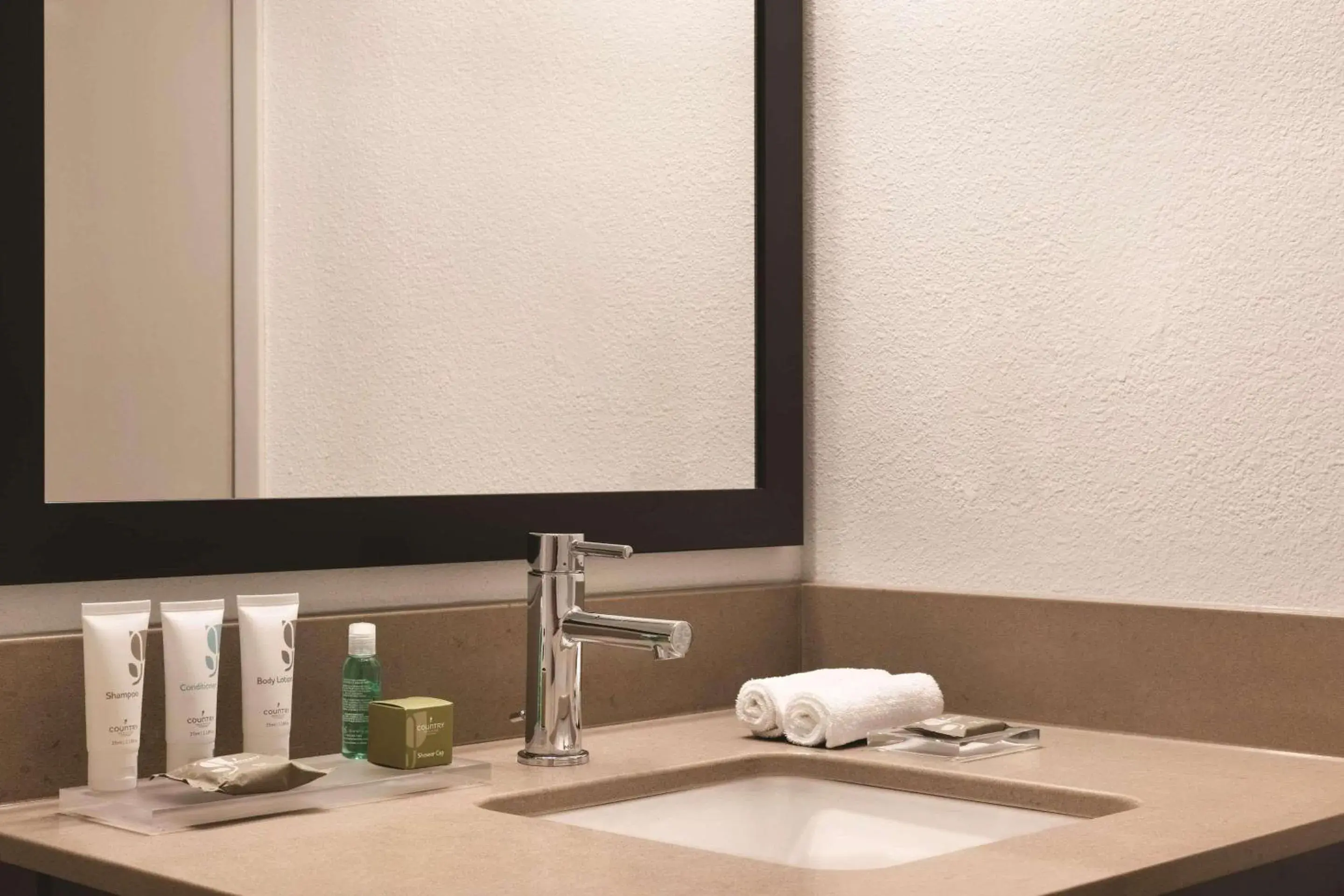 Bedroom in Country Inn & Suites by Radisson, Northfield, MN Bedroom in Country Inn & Suites by Radisson, Northfield, MN