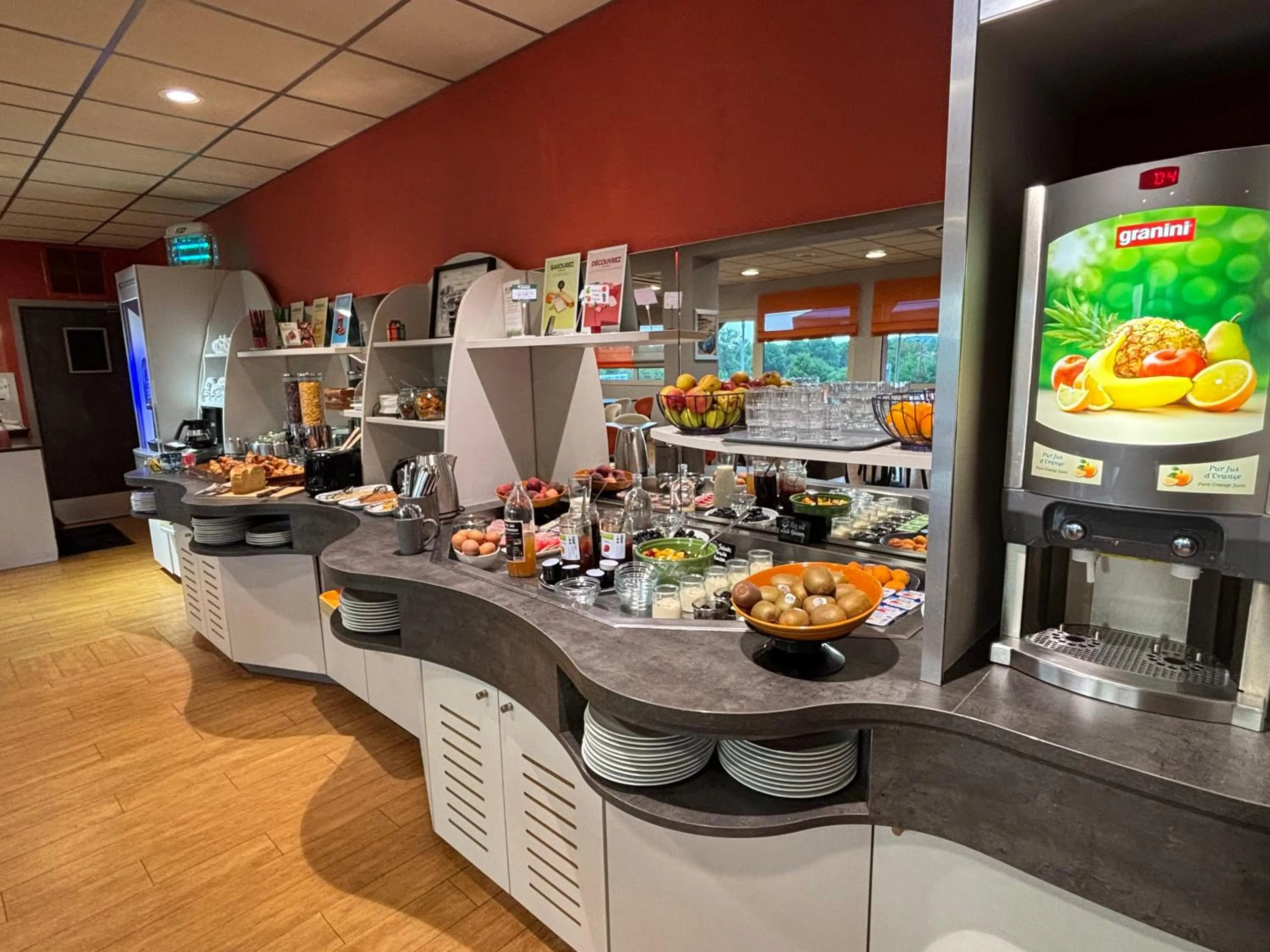 Buffet breakfast in Brit Hotel Les Evens