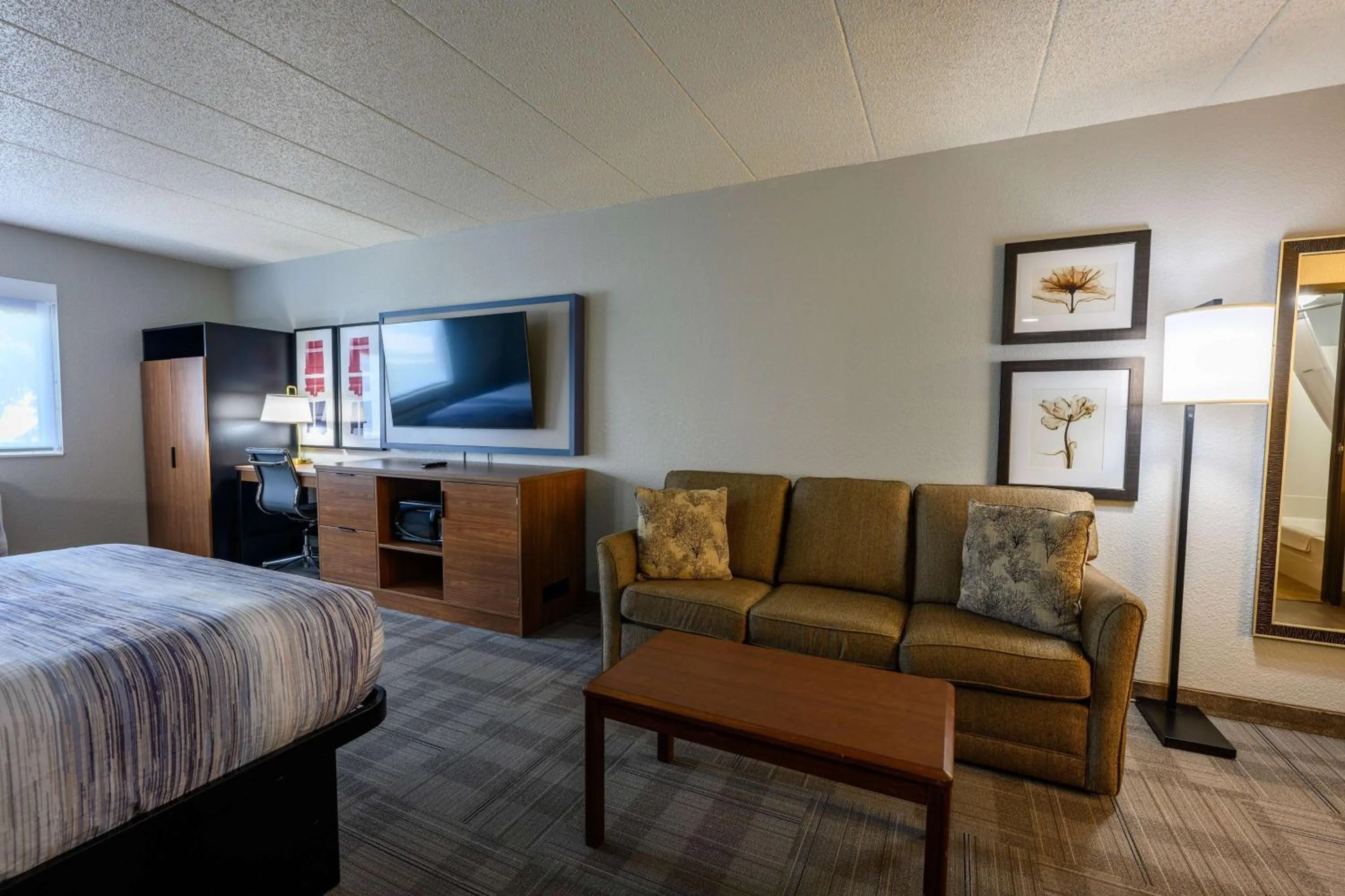 Photo of the whole room, Bed in AmericInn by Wyndham Monroe