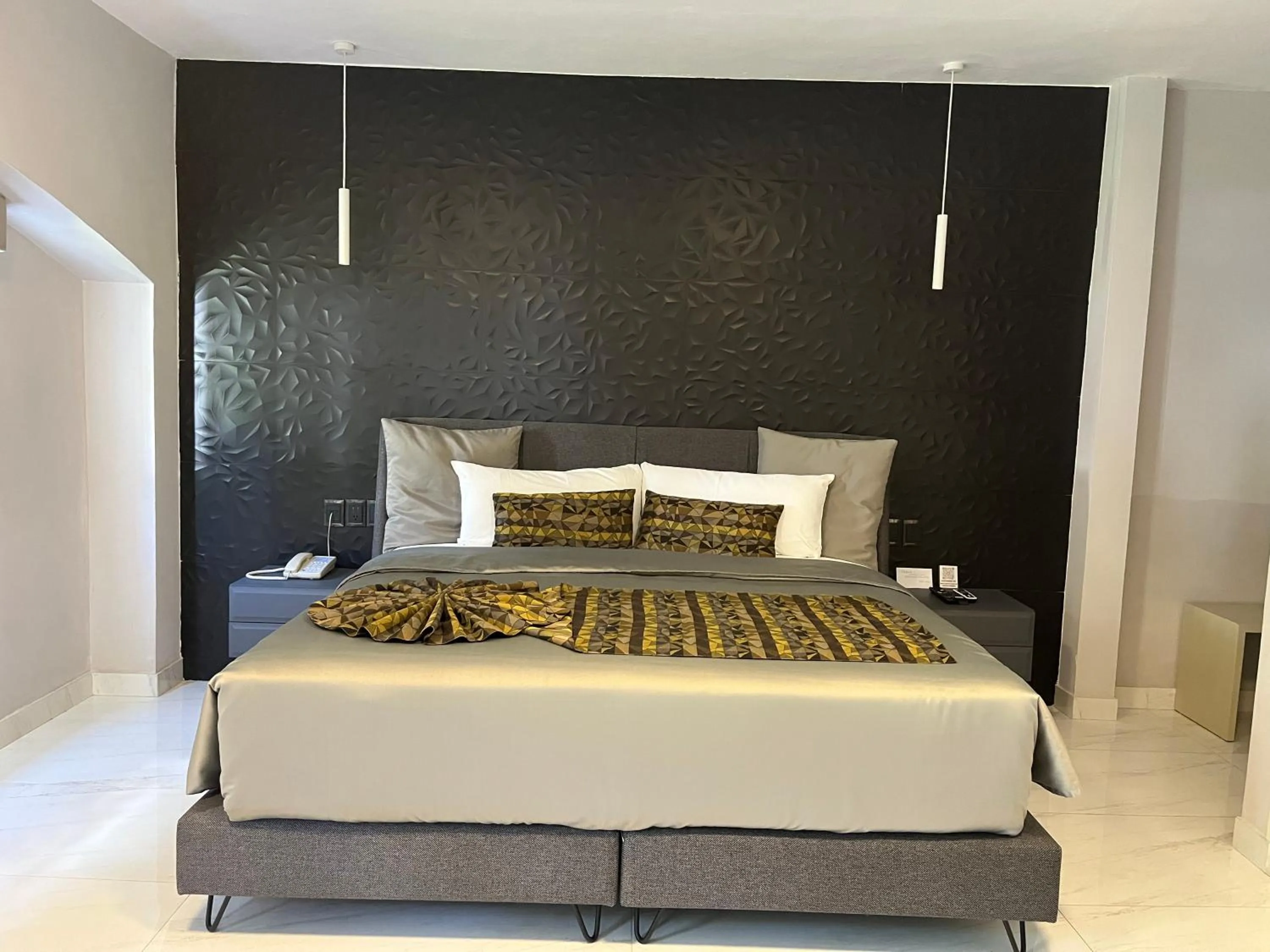 Bed in Chanpaal Hotel Boutique - Only Adults