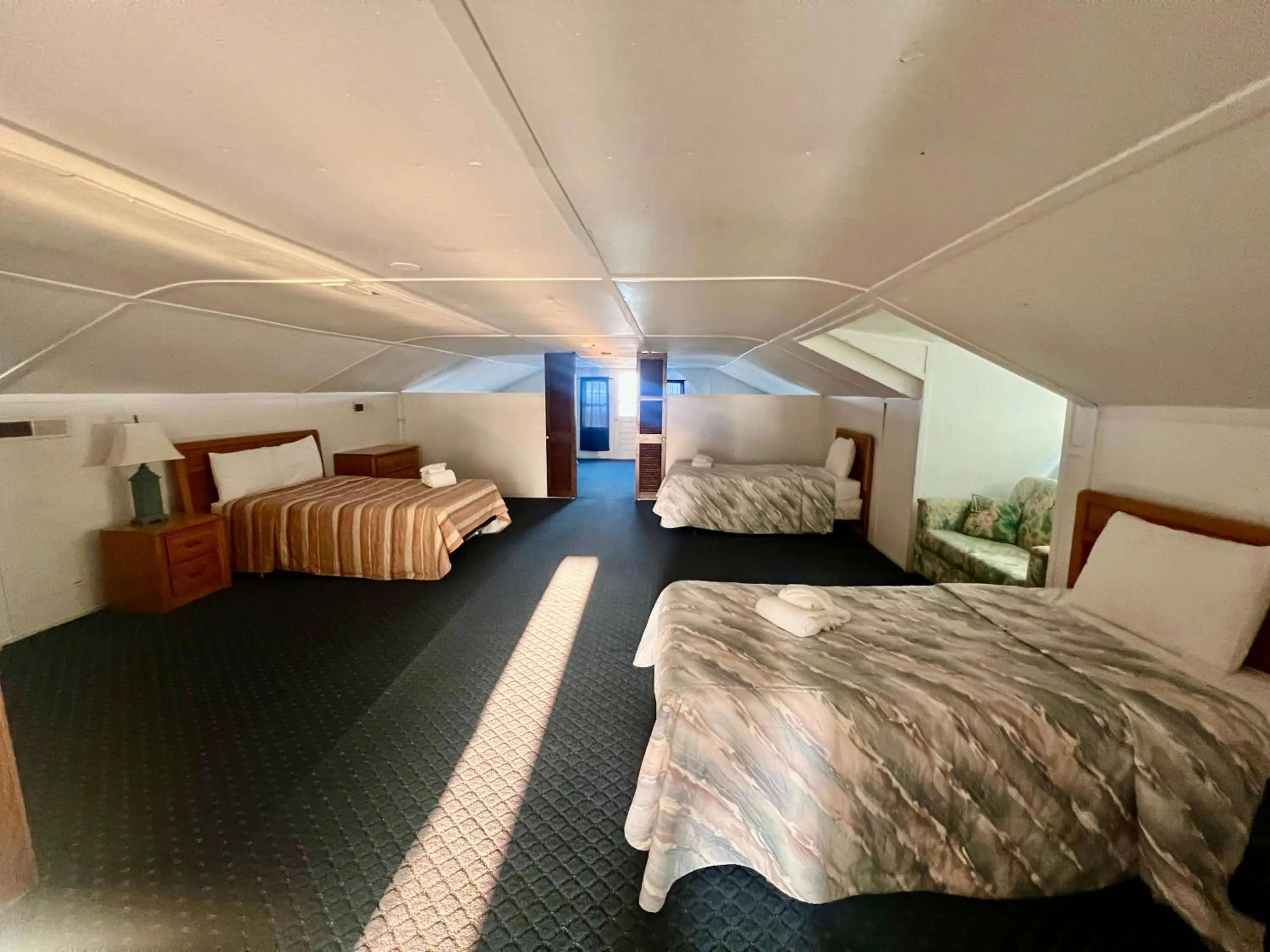 Bed in Majestic Hotel & Apartments