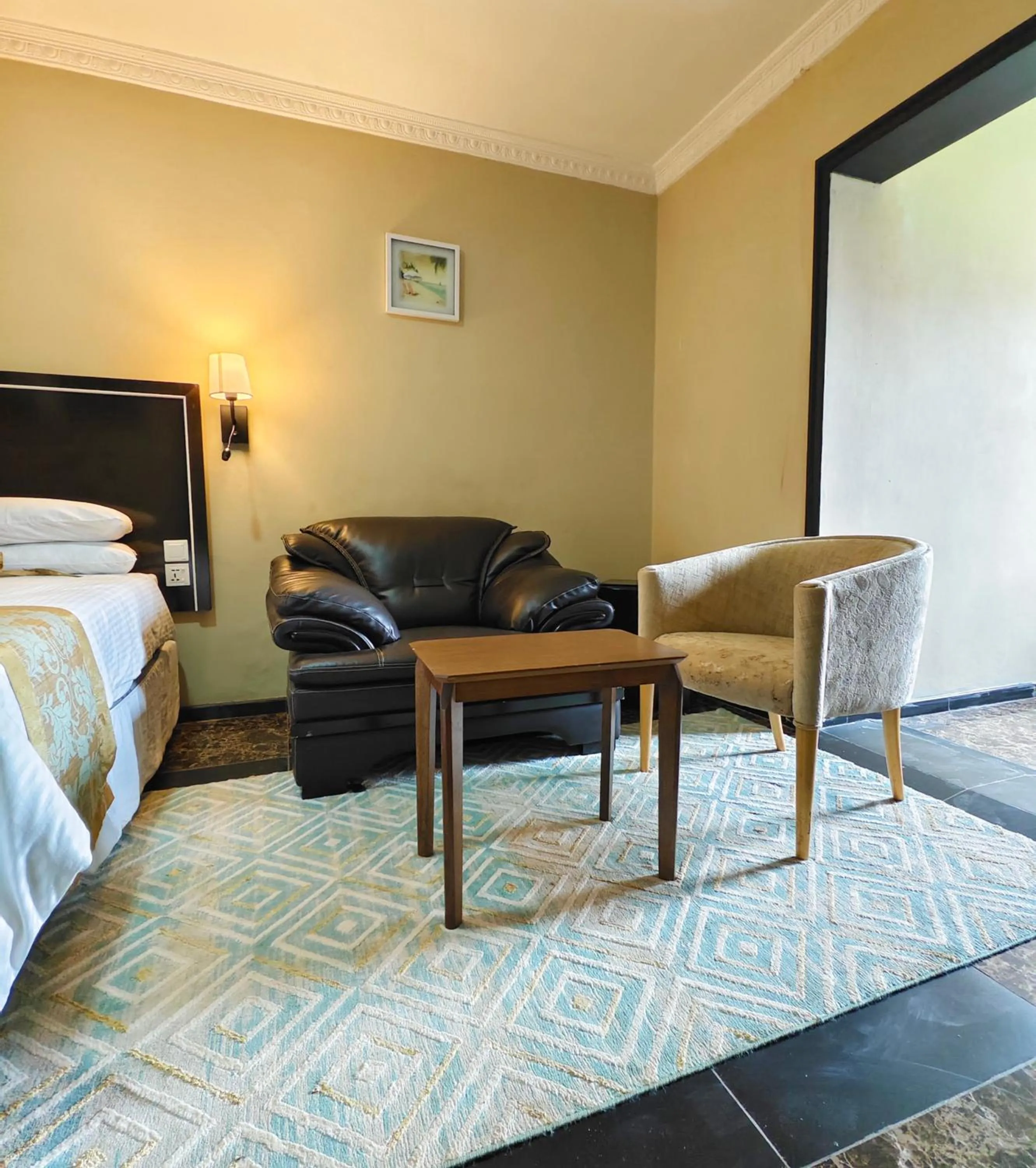 Seating area, Bed in Annavilla7 Lilongwe hotel