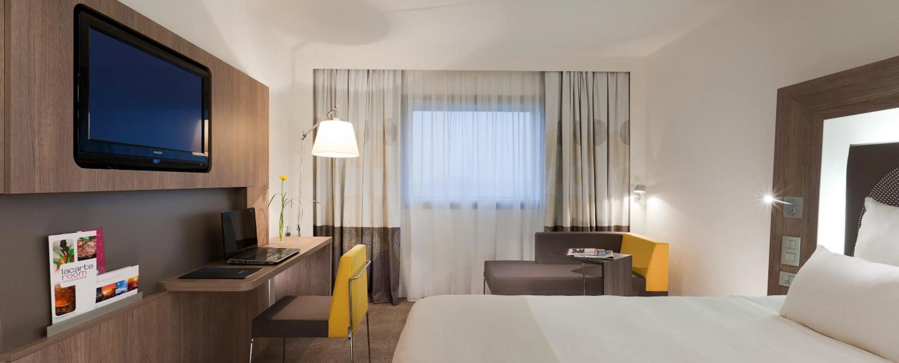 Photo of the whole room, Bed in Novotel Paris La Defense Esplanade