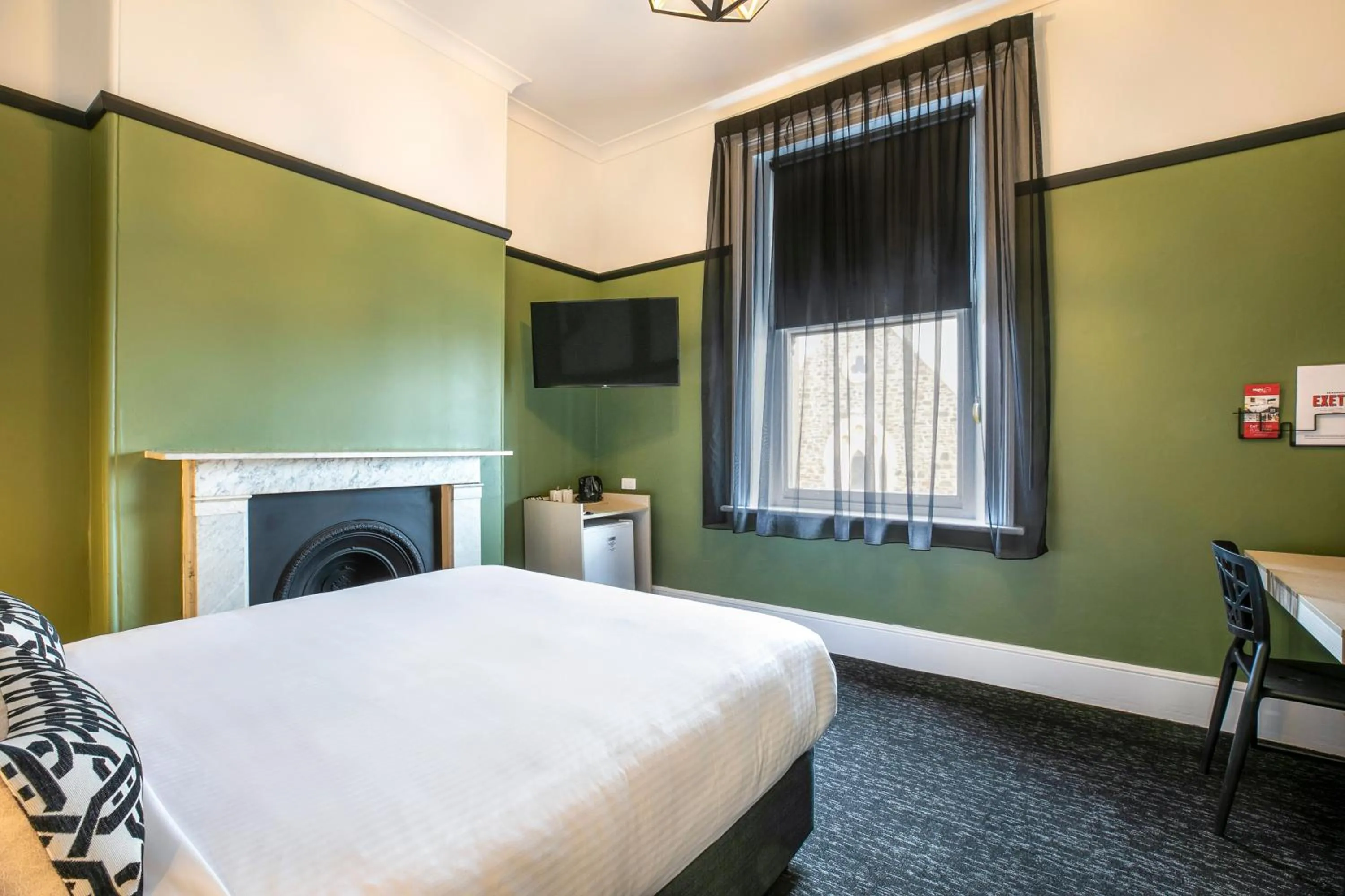 Bed in Nightcap at Exeter Hotel