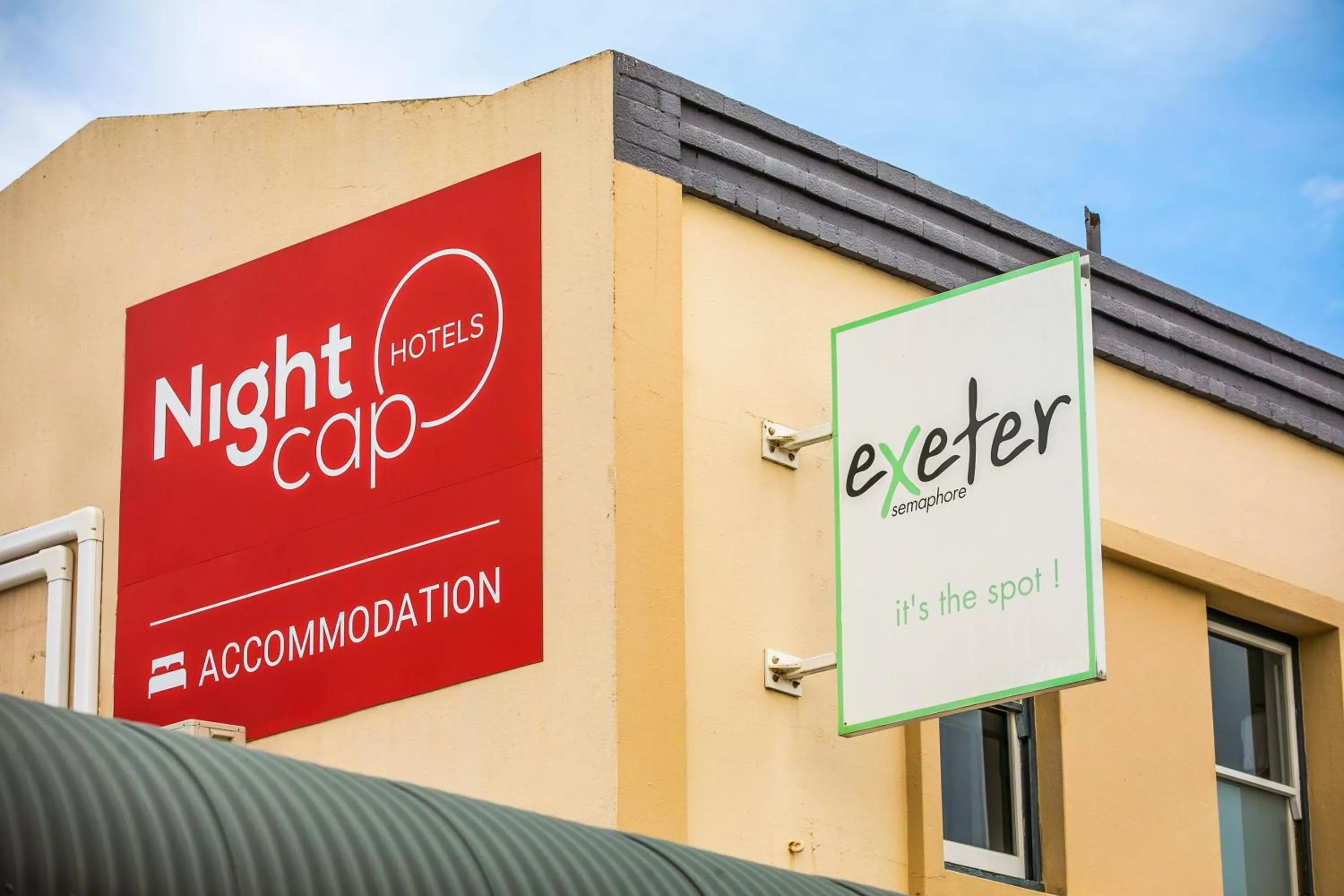 Property logo or sign in Nightcap at Exeter Hotel